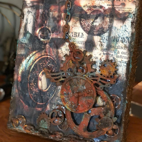 Rustic decor piece with the Pocket Watches decoupage paper on top.