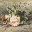 Close-up of a rice paper design of vintage parchment with pink roses on a table.