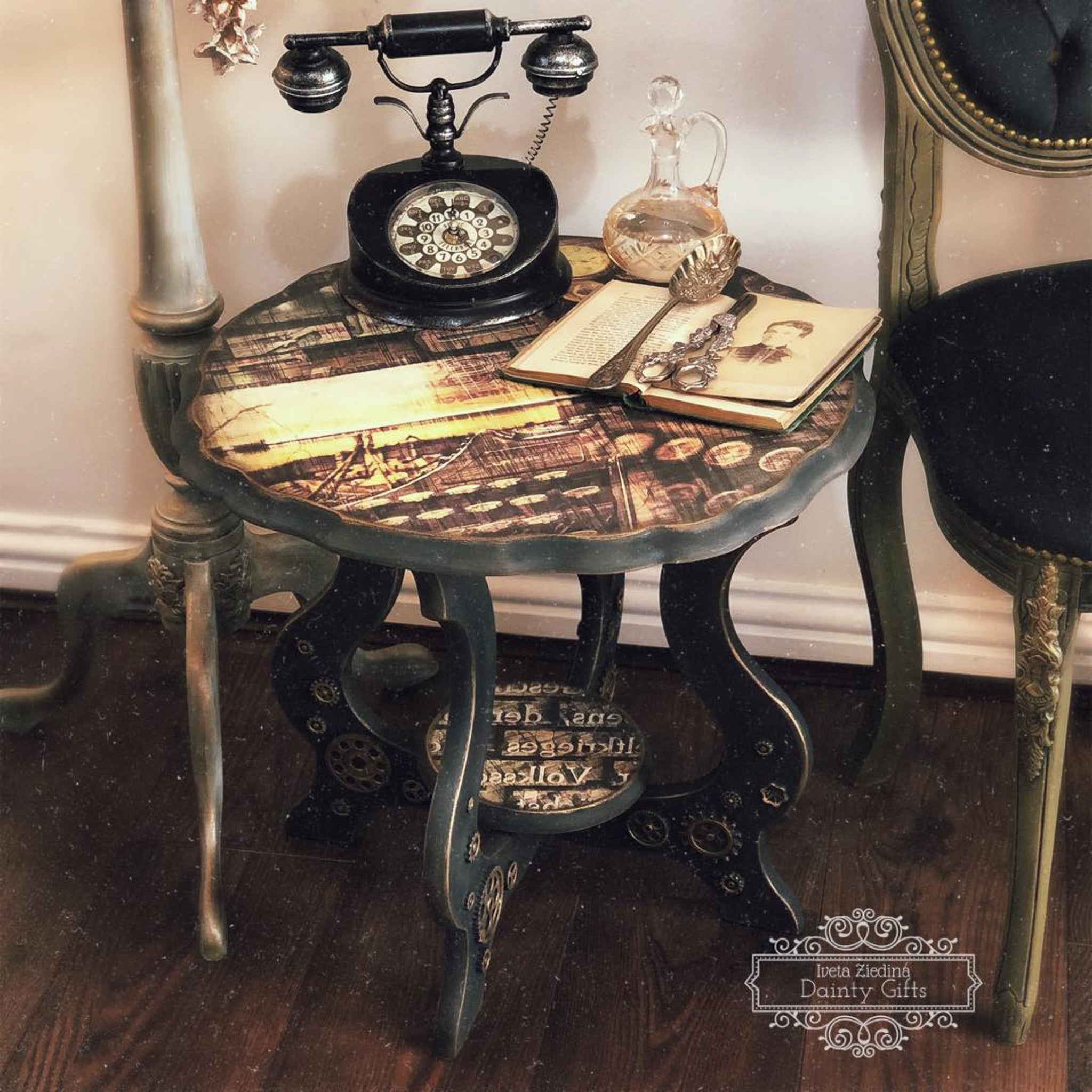 A vintage phone side table features The Press rice paper. An Iveta Ziedina Dainty Gifts logo is in the bottom right corner of the photo.