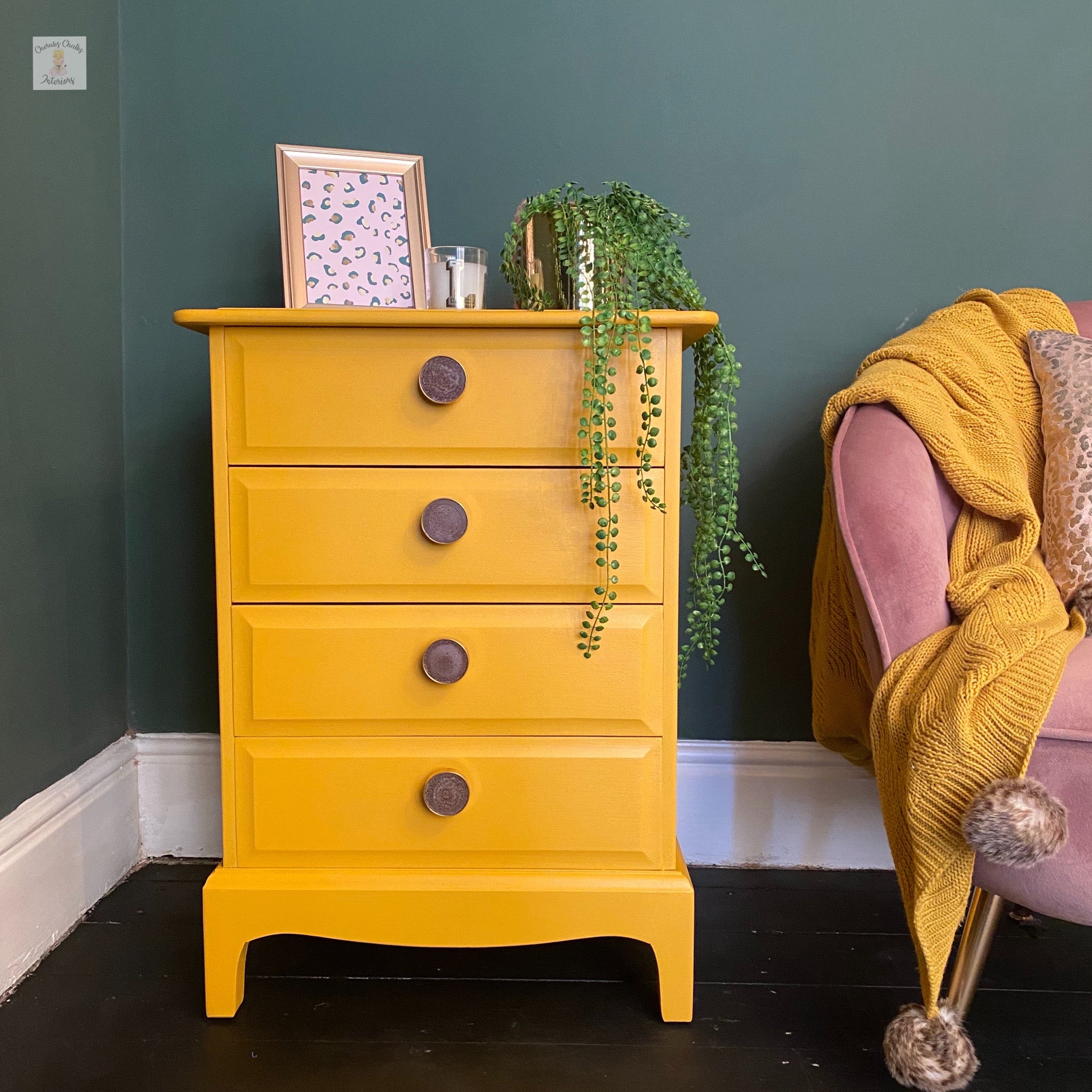 A vintage 4-drawer nightstand refurbished by Cherubs Chalks Interiors is painted in Dixie Belle's Colonel Mustard chalk mineral paint.