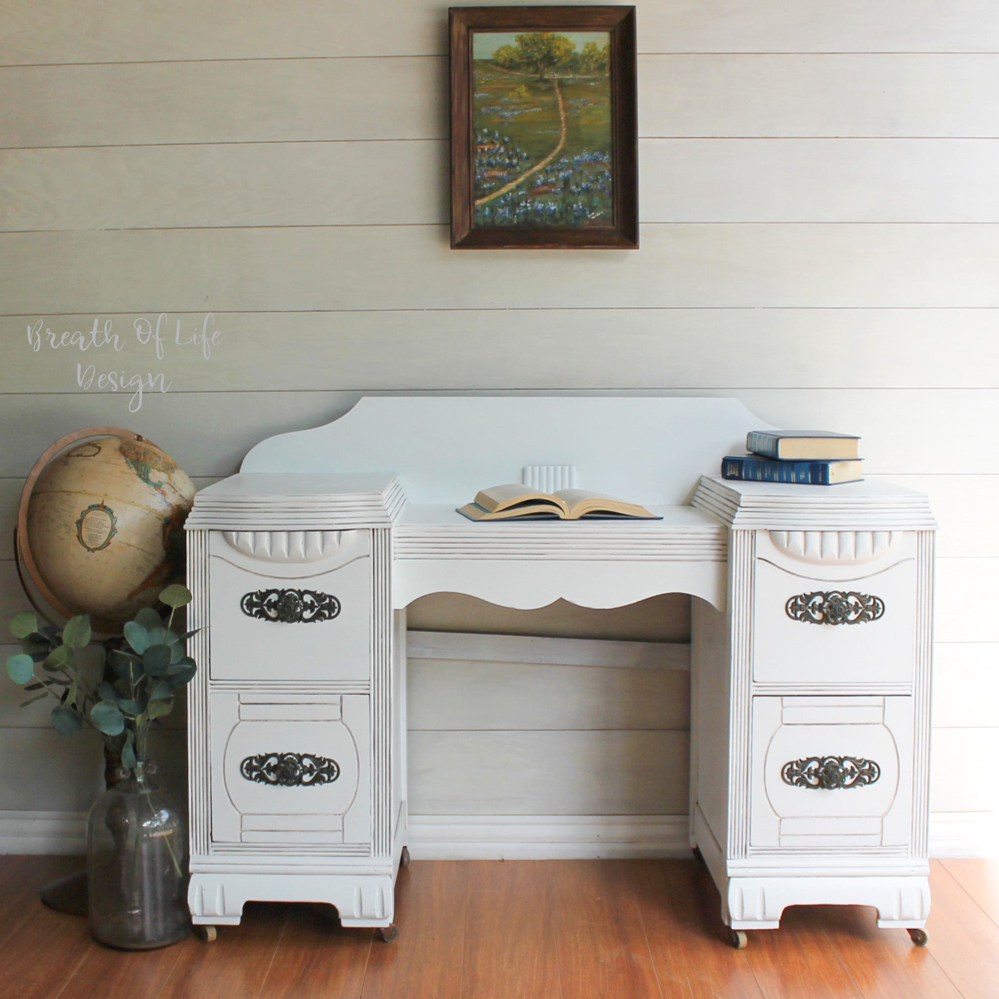 A vintage vanity refurbished by Breath of Life Design is painted in Dixie Belle's Cotton chalk mineral paint.
