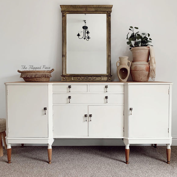 A vintage dresser refurbished by The Flipped Piece is a painted in Dixie Belle's Drop Cloth chalk mineral paint.
