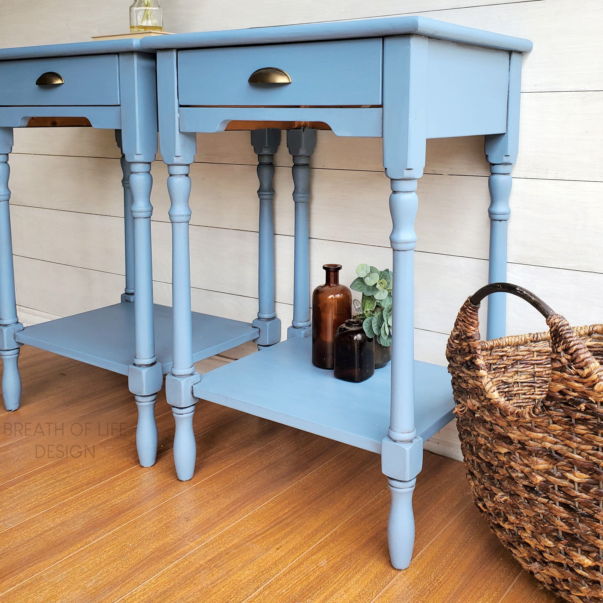 Two vintage end-tables refurbished by Breath of Life Designs are painted in Dixie Belle's Dusty Blue chalk mineral paint.