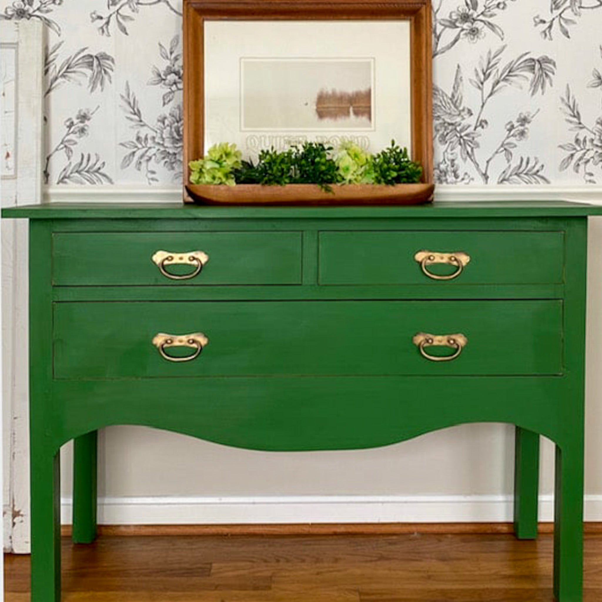 A vintage 3-drawer entry-way table is painted in Dixie Belle's Evergreen chalk mineral paint.