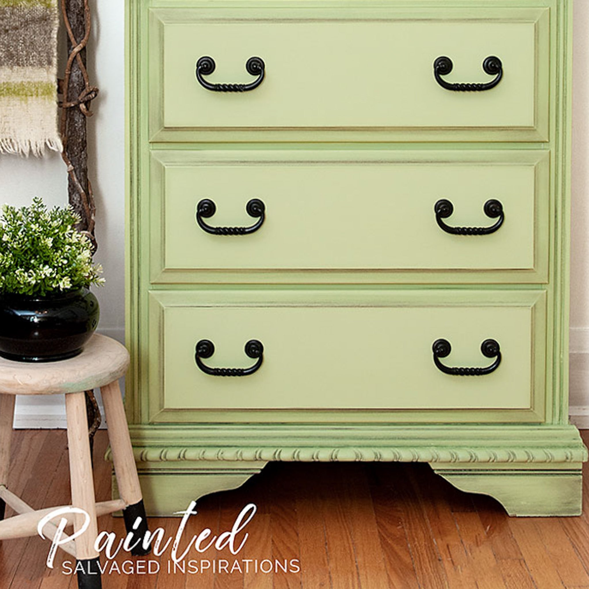 A vintage dresser refurbished by Painted Salvaged Inspirations is painted in Dixie Belle's Farmhouse Green chalk mineral paint.