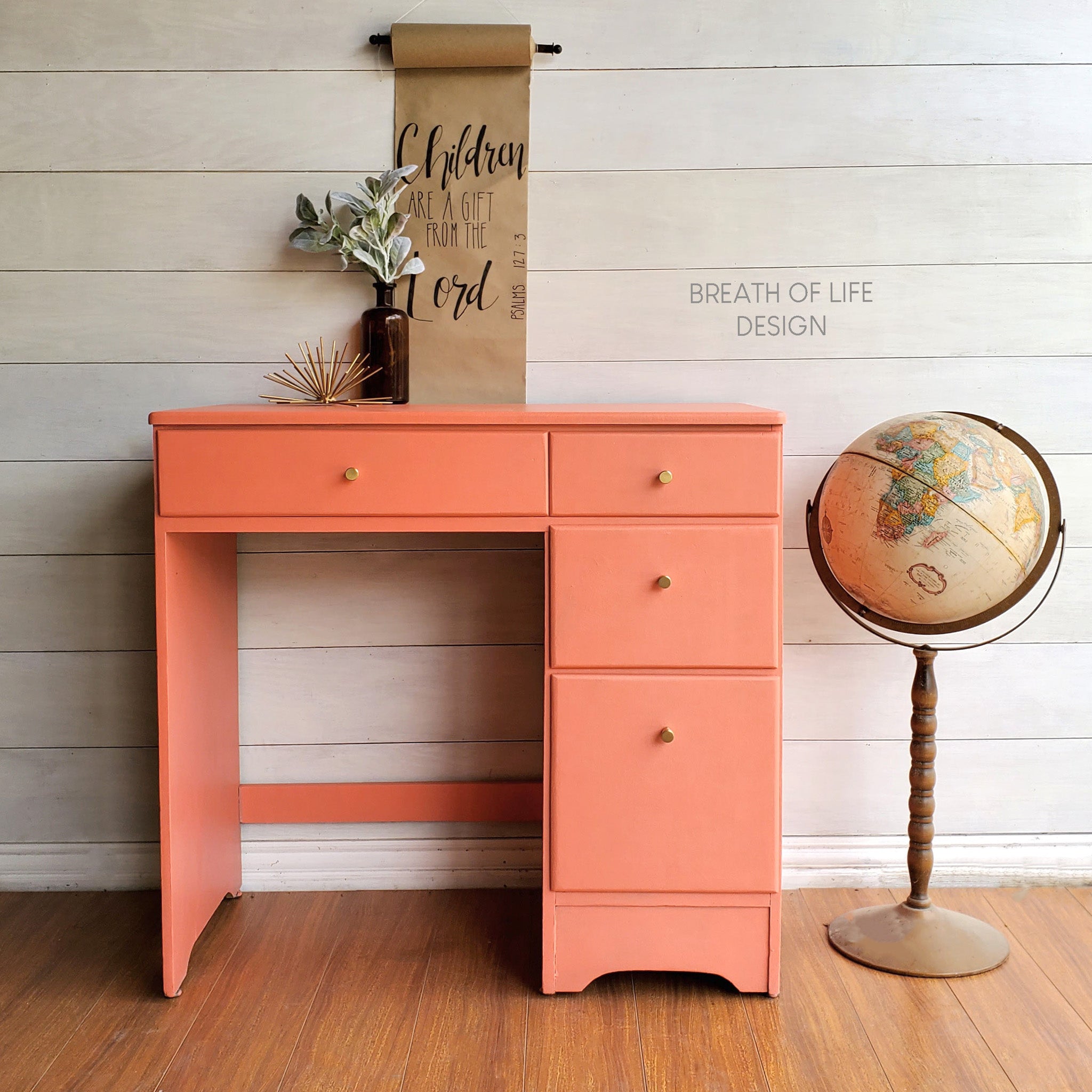 A small 4-drawer desk refurbished by Breath of Life Design is painted in Dixie Belle's Flamingo chalk mineral paint.