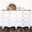 A vintage 8-drawer dresser refurbished by Lilly Moon Vintage is painted in Dixie Belle's Fluff chalk mineral paint.