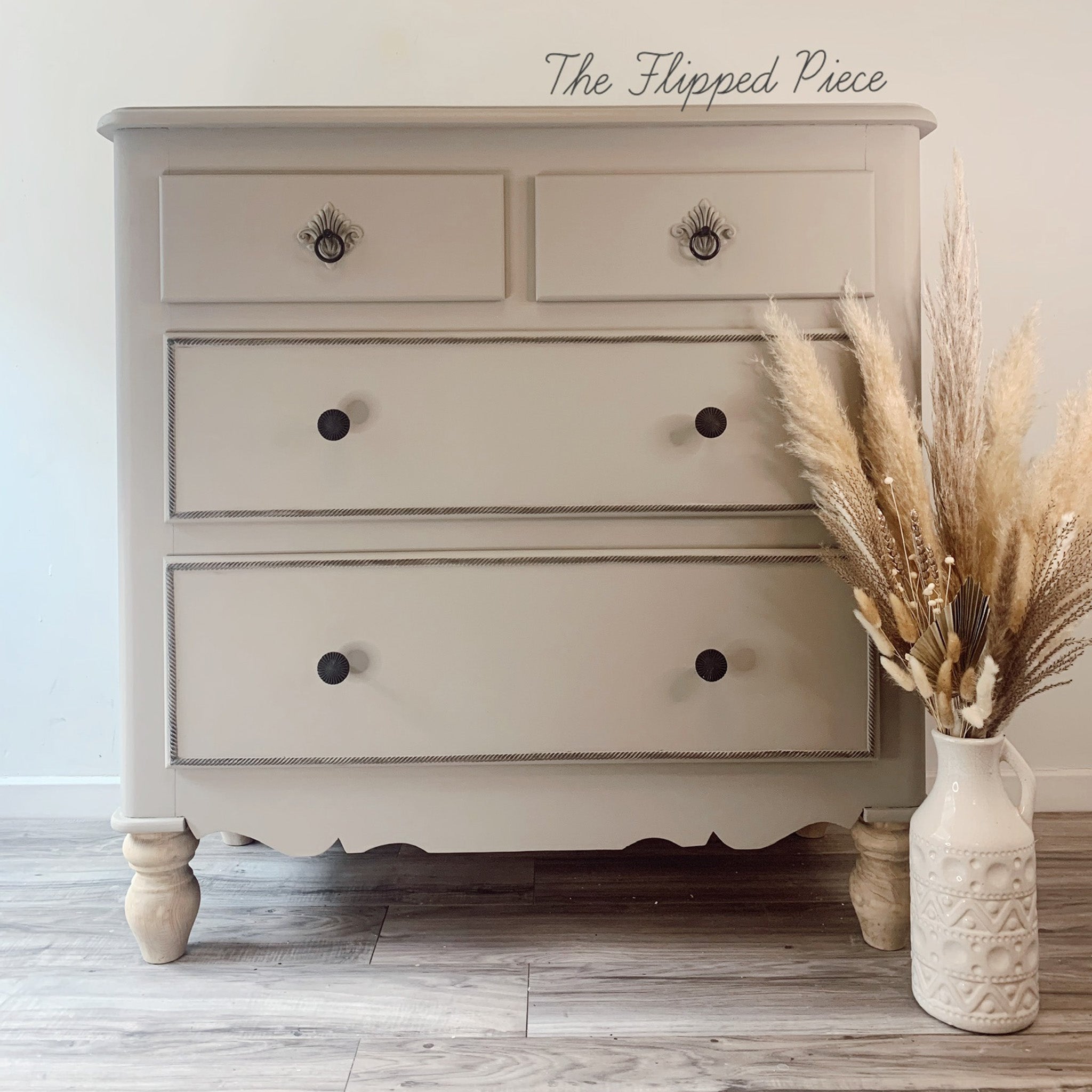 A vintage small 4-drawer dresser refurbished by The Flipped Piece is painted in Dixie Belle's French Linen chalk mineral paint.
