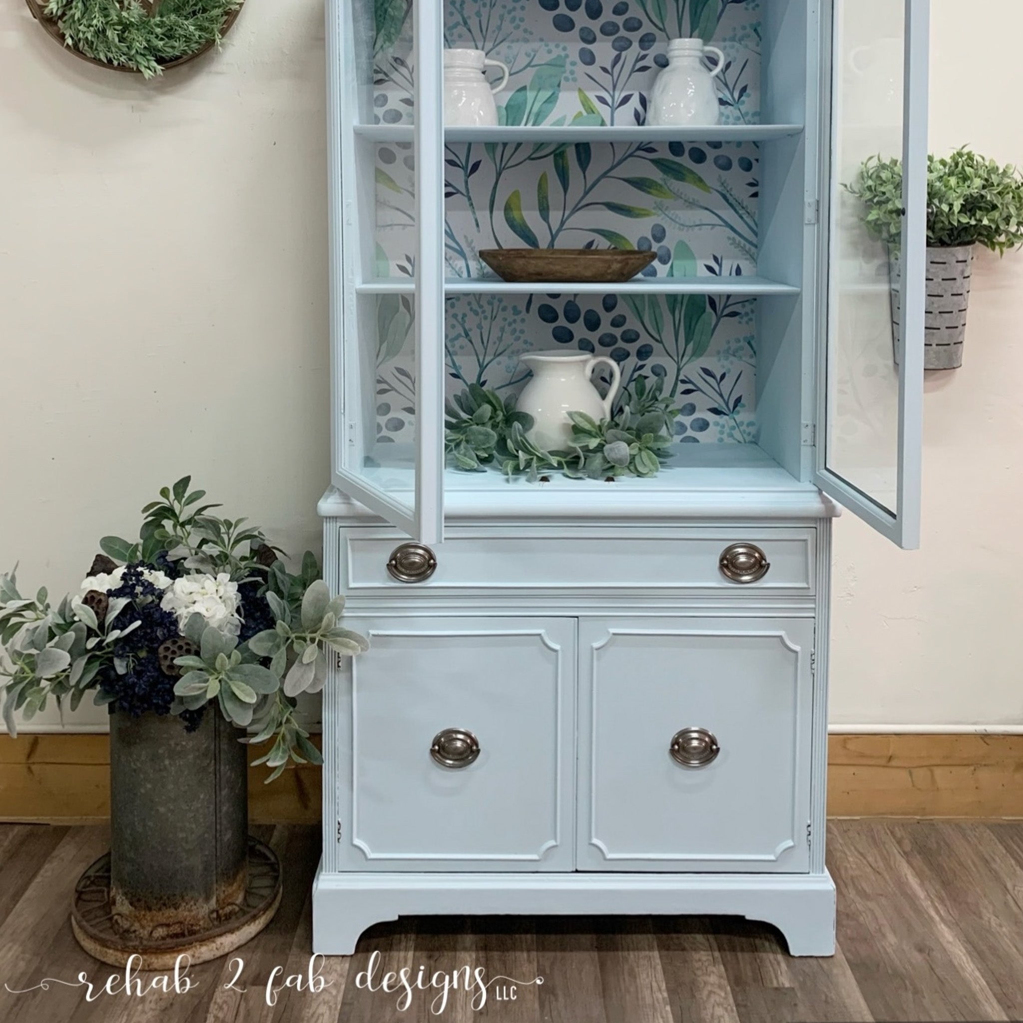 A vintage hutch refurbished by Rehab 2 Fab Designs is painted in Dixie Belle's Haint Blue chalk mineral paint.