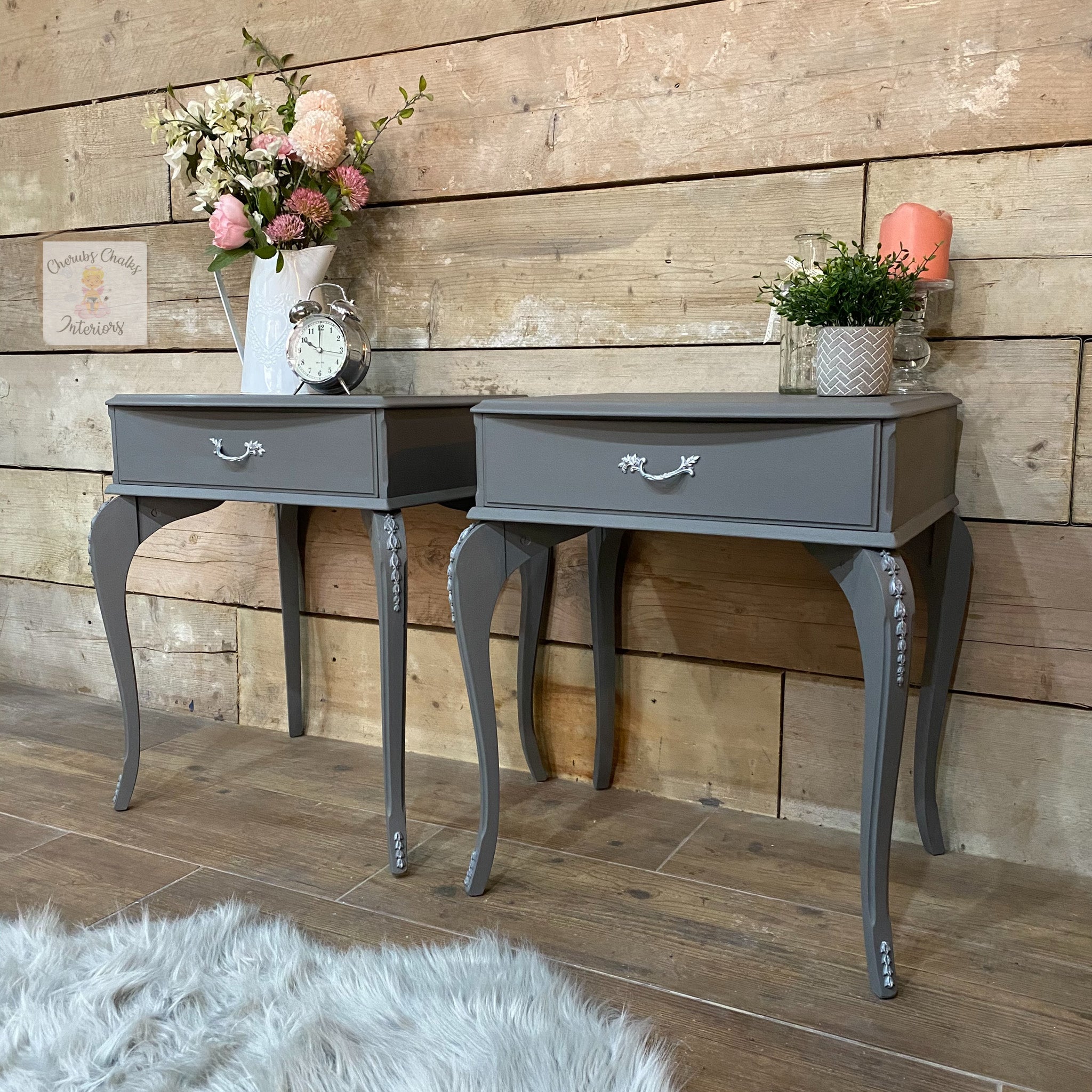 Two vintage nightstands refurbished by Cherubs Chalks Interiors are painted in Dixie Belle's Hurricane Gray chalk mineral paint.