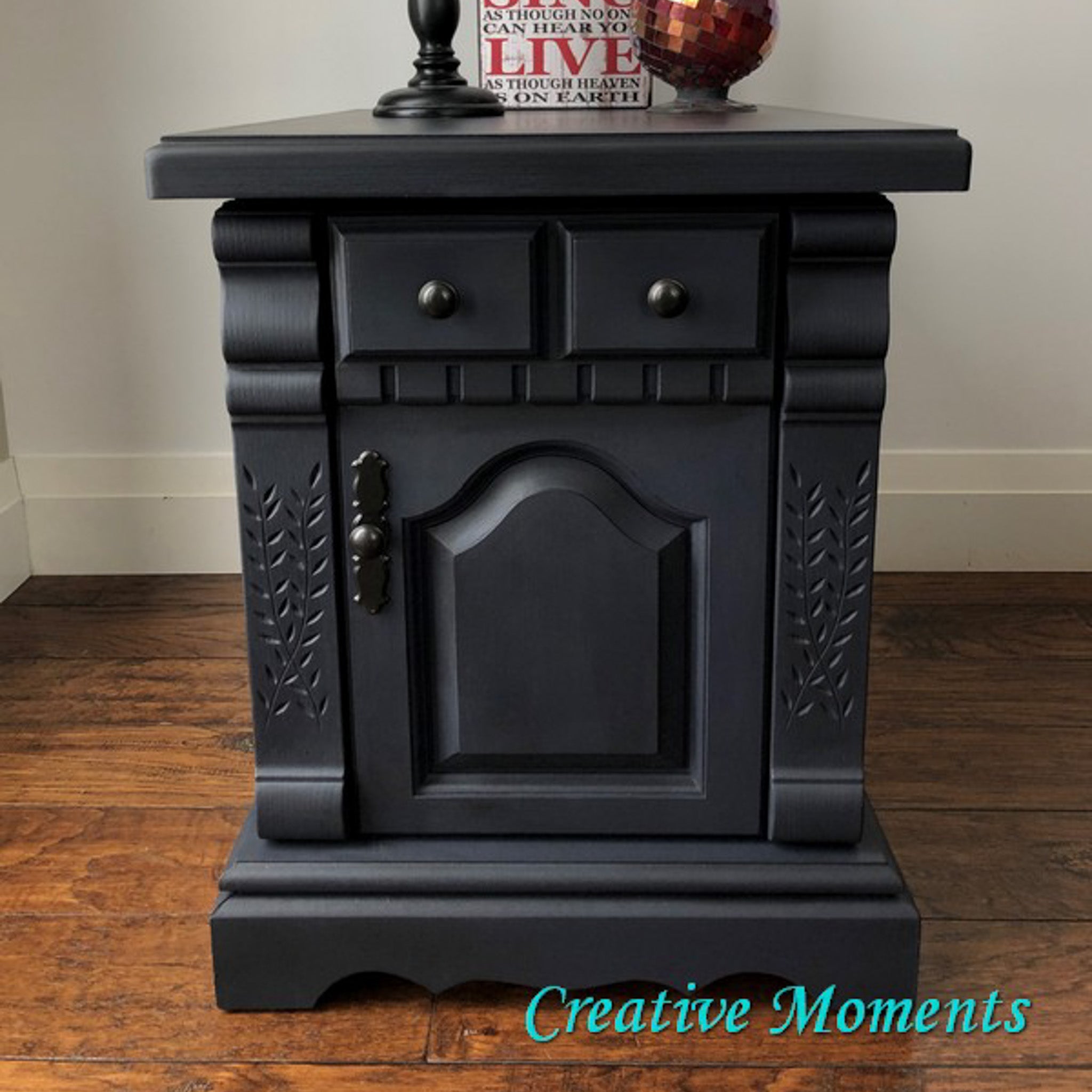 A vintage end table refurbished by Creative Moments is painted in Dixie Belle's In the Navy chalk mineral paint.