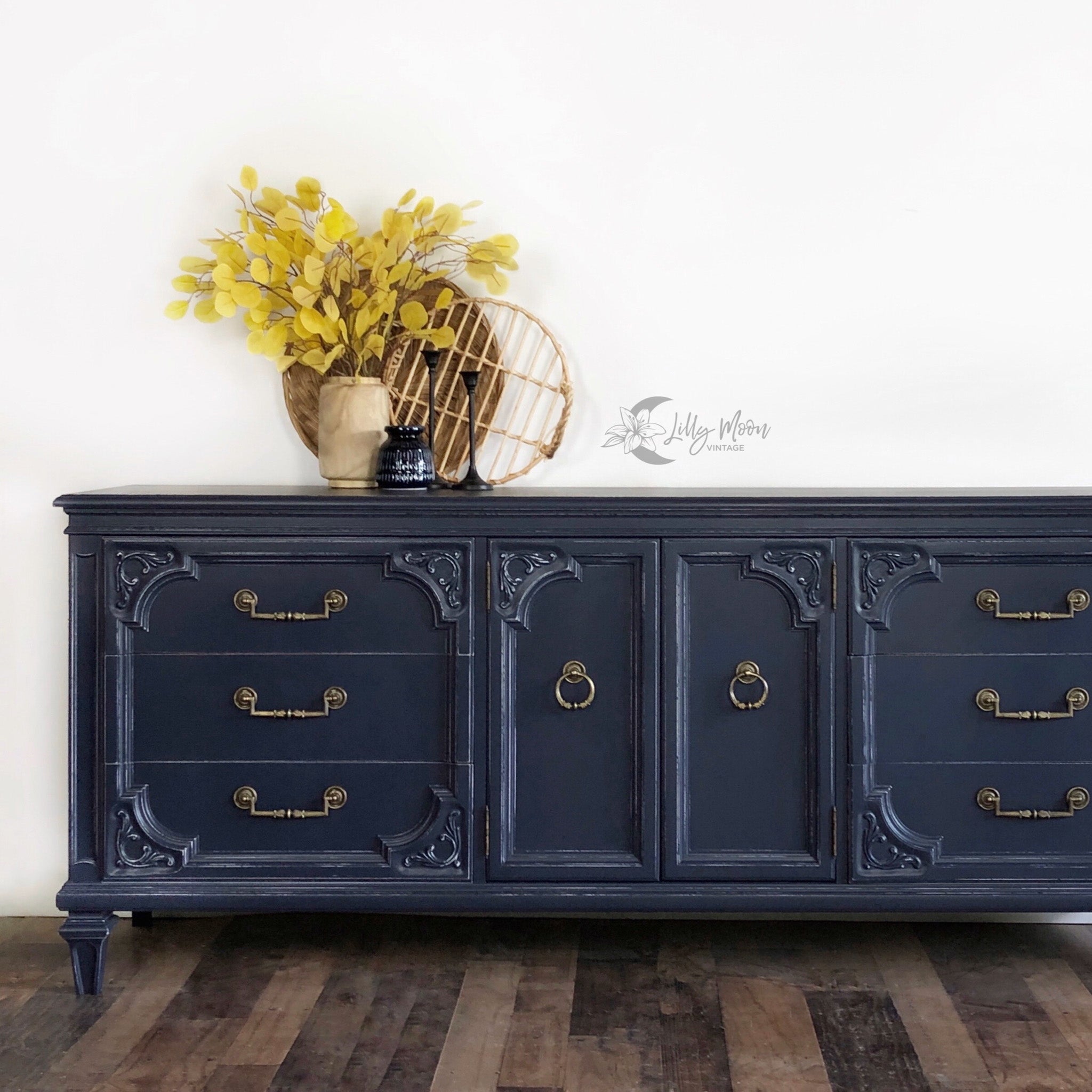 A vintage buffet table refurbished by Lilly Moon Vintage is painted in Dixie Belle's In the Navy chalk mineral paint.