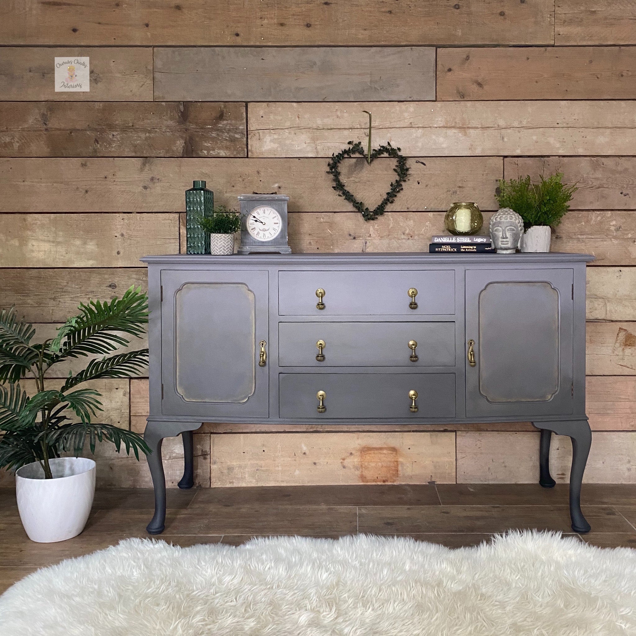 A vintage small buffet table refurbished by Cherubs Chalks Interoirs is painted in Dixie Belle's Mason Dixon chalk mineral paint.