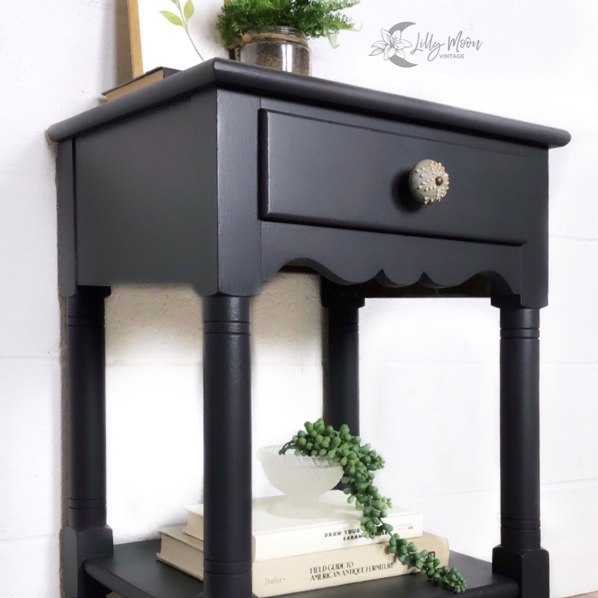 A vintage end table refurbished by Lilly Moon Vintage is painted in Dixie Belle's Midnight Sky chalk mineral paint.