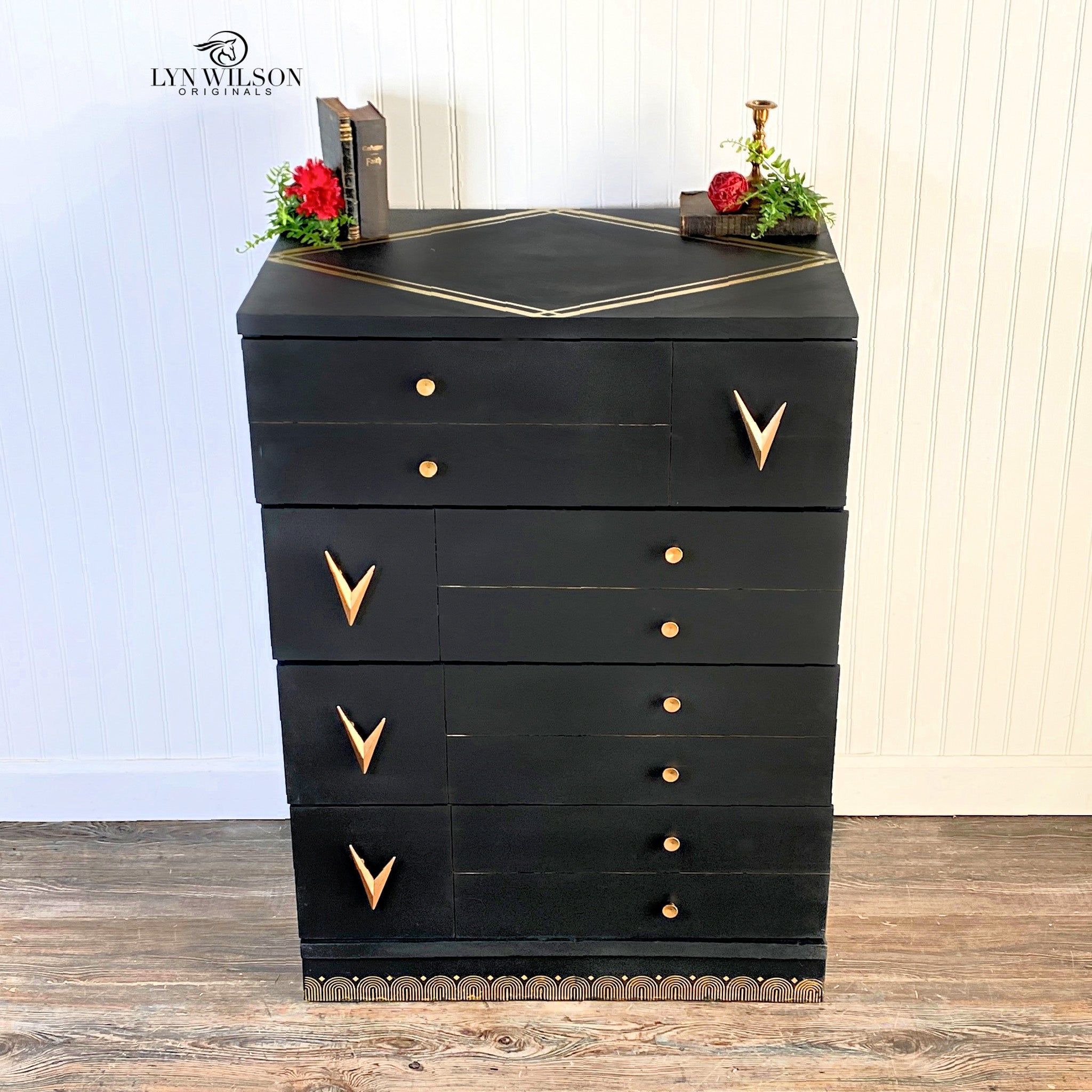 A vintage 4-drawer dresser with gold accents refurbished by Lyn Wilson Originals is painted in Dixie Belle's Midnight Sky chalk mineral paint.