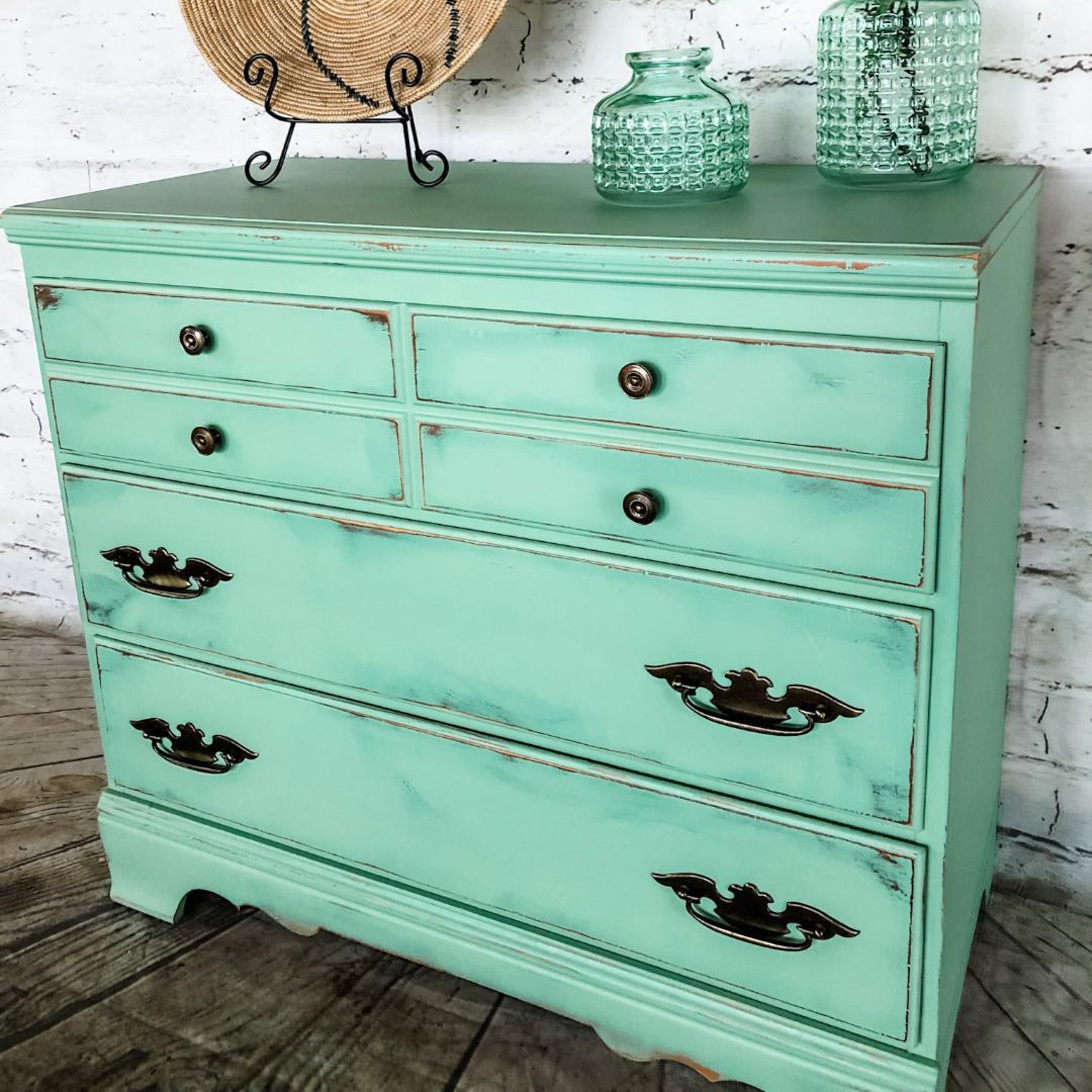 A vintage 4-drawer dresser is painted in Dixie Belle's Mint Julep chalk mineral paint.
