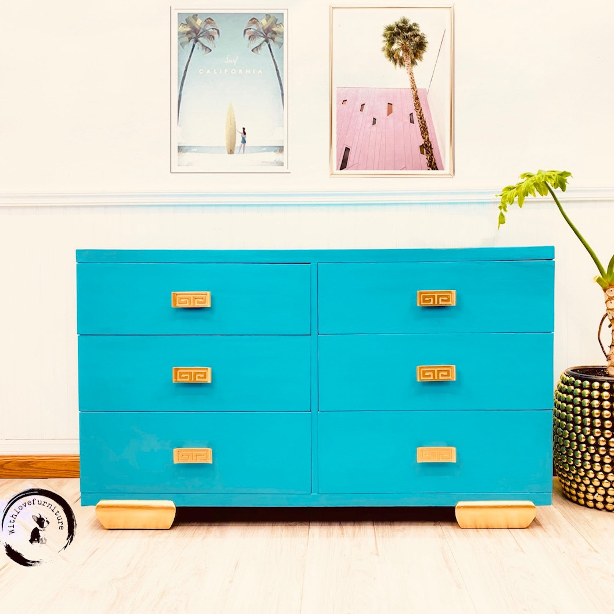 A vintage 6-drawer dresser is painted in Dixie Belle's Pure Ocean chalk mineral paint and has gold accents.