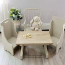 Three vintage childrens chairs and a table are painted in Dixie Belle's Sand Bar chalk mineral paint.