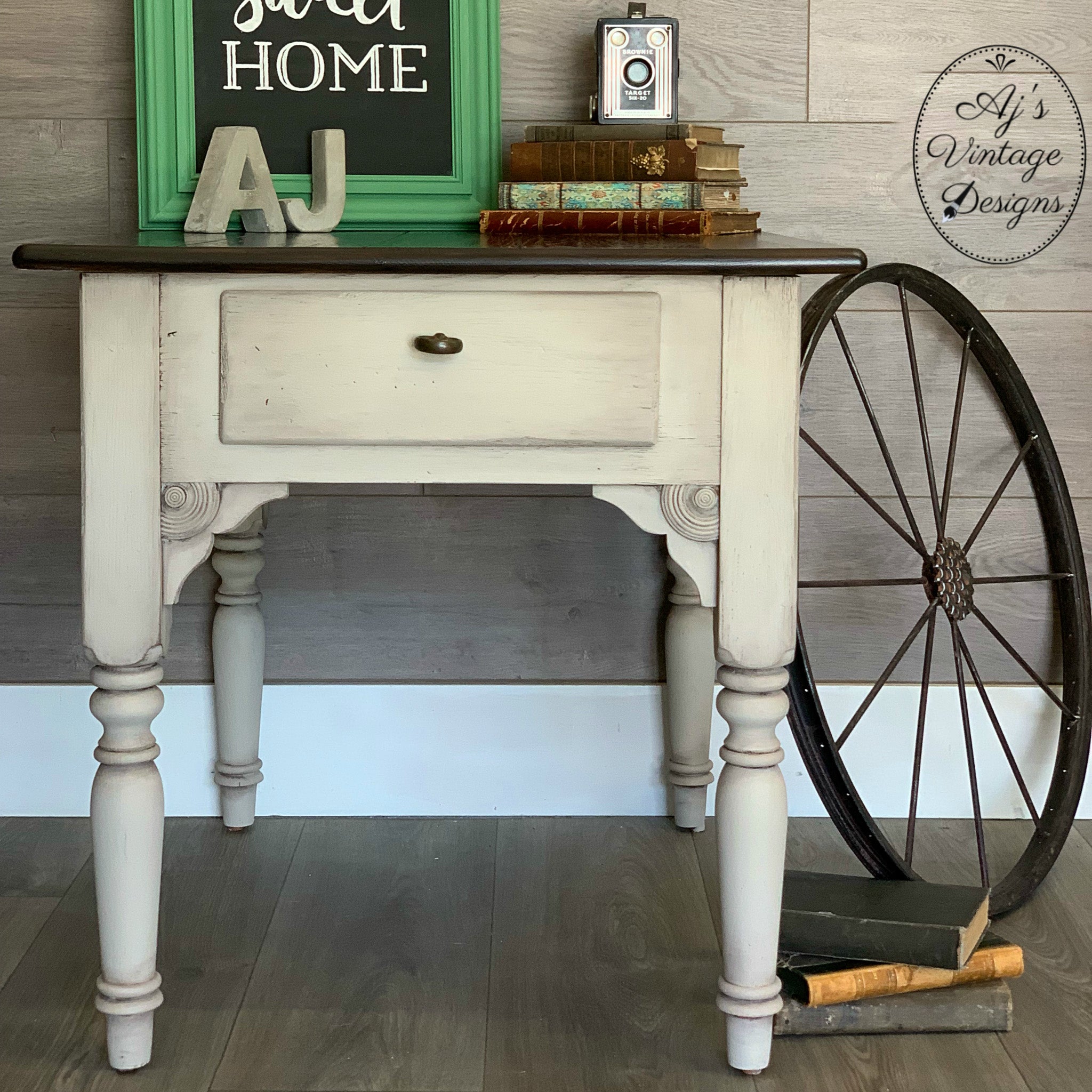 A vintage end table refurbished by Aj's Vintage Designs is painted in Dixie Belle's Sand Bar chalk mineral paint.