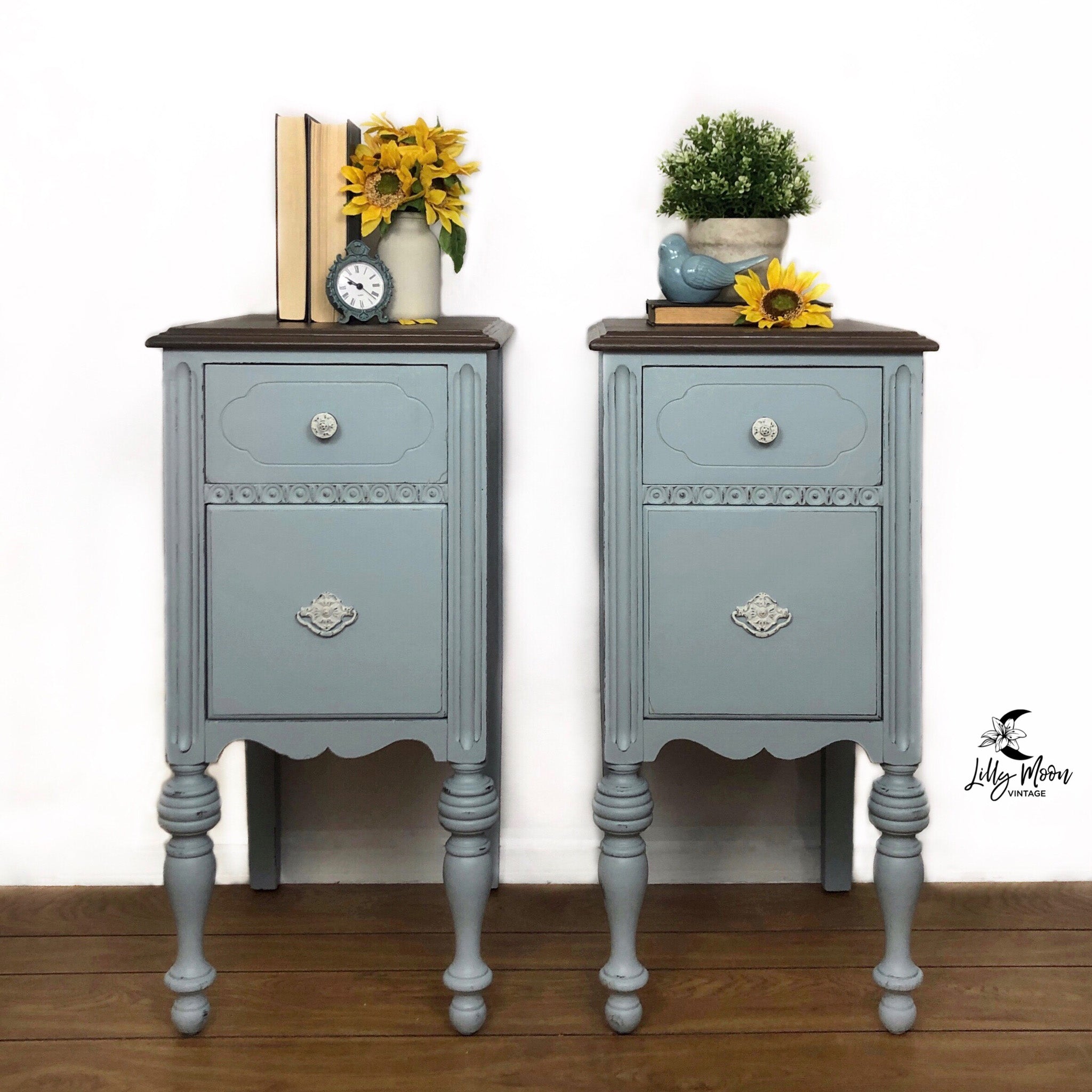 Two vintage nightstands refurbished by Lilly Moon Vintage are painted in Dixie Belle's Savannah Mist chalk mineral paint and have down brown tops.