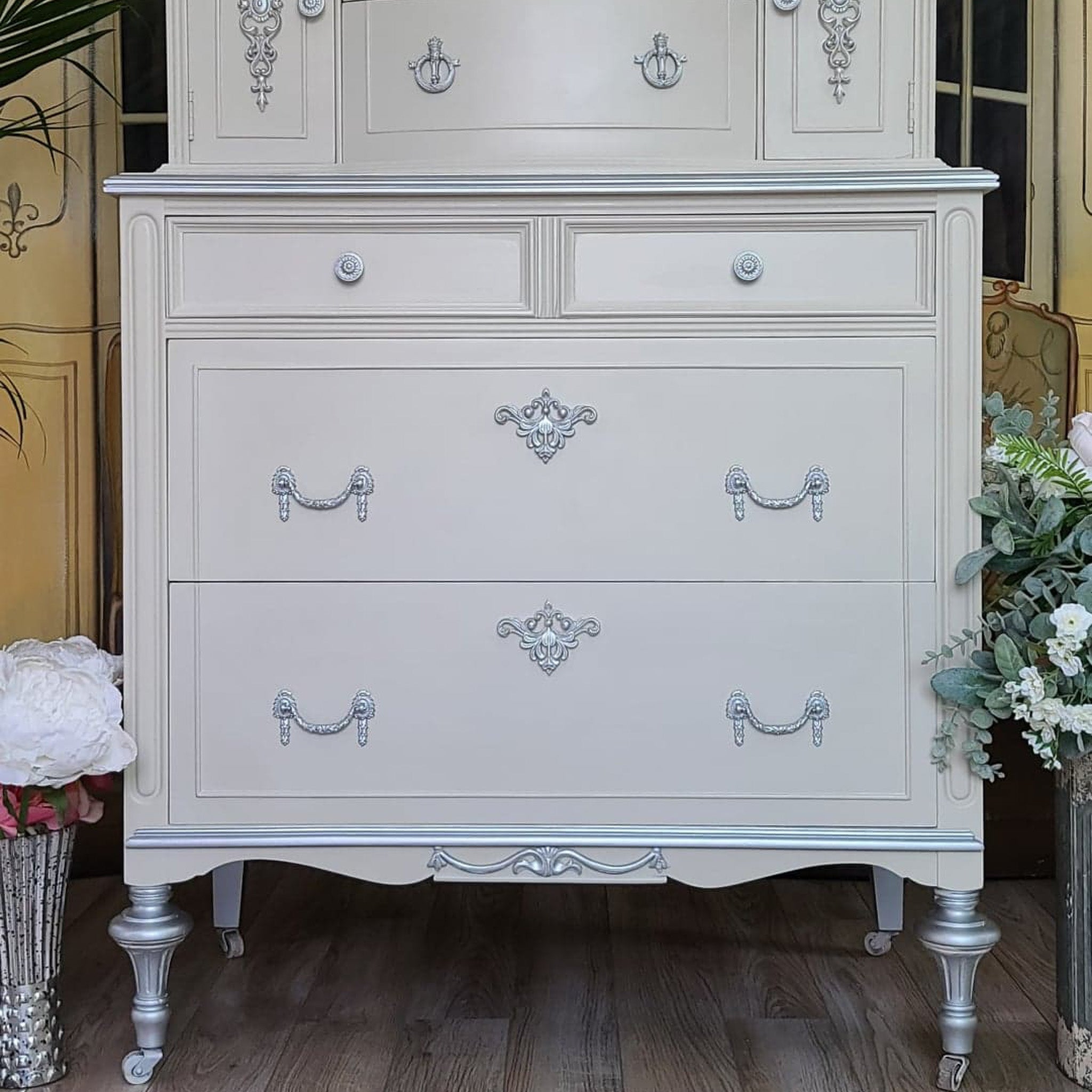 A close-up of a vintage lingerie dresser is painted in Dixie Belle's Sawmill Gravy chalk mineral paint.