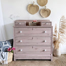 A vintage dresser refurbished by Lilly Moon Vintage is painted in Dixie Belle's Tea Rose chalk mineral paint.