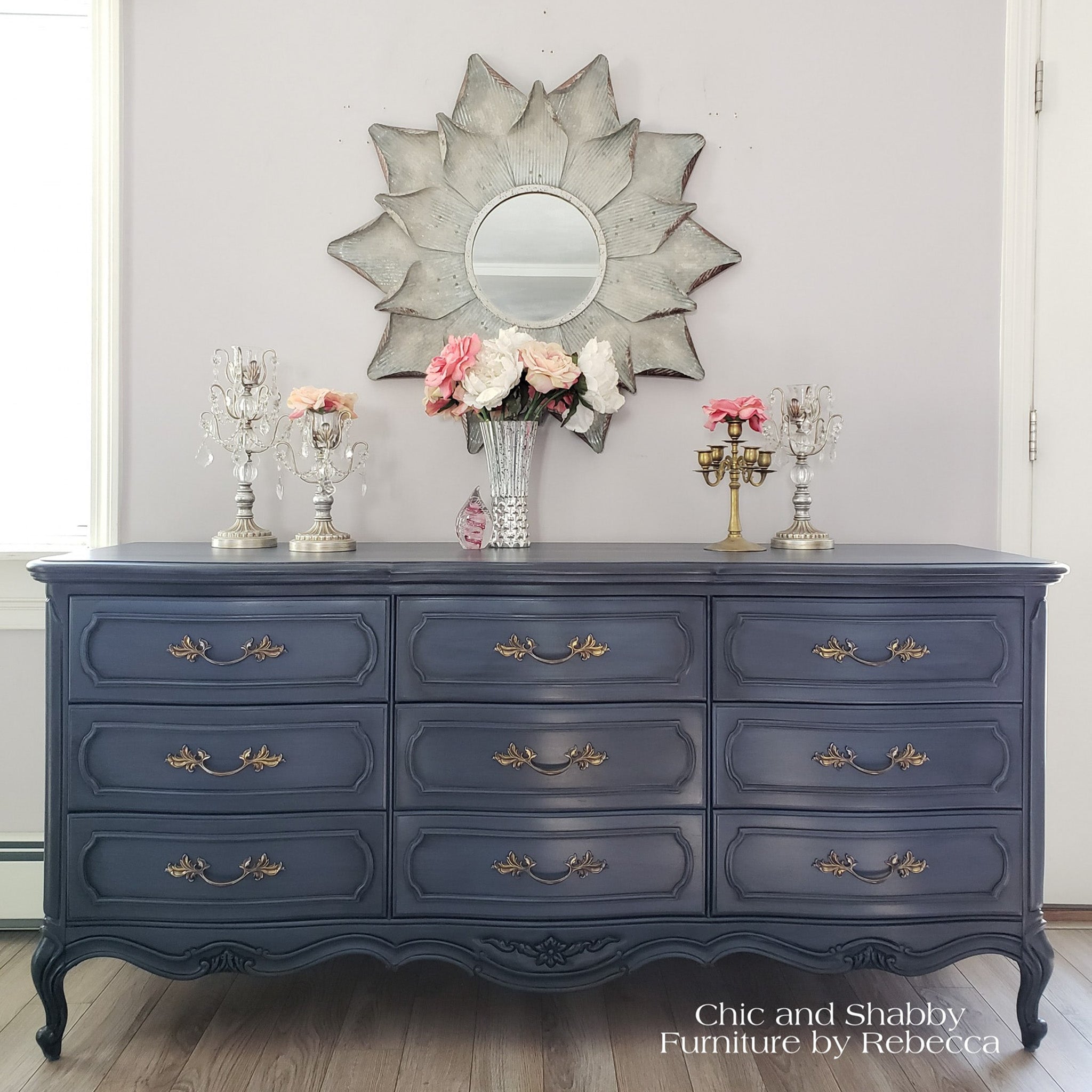 A vintage 9-drawer dresser refurbished by Chic and Shabby Furniture by Rebecca is painted in Dixie Belle's Yankee Blue chalk mineral paint.