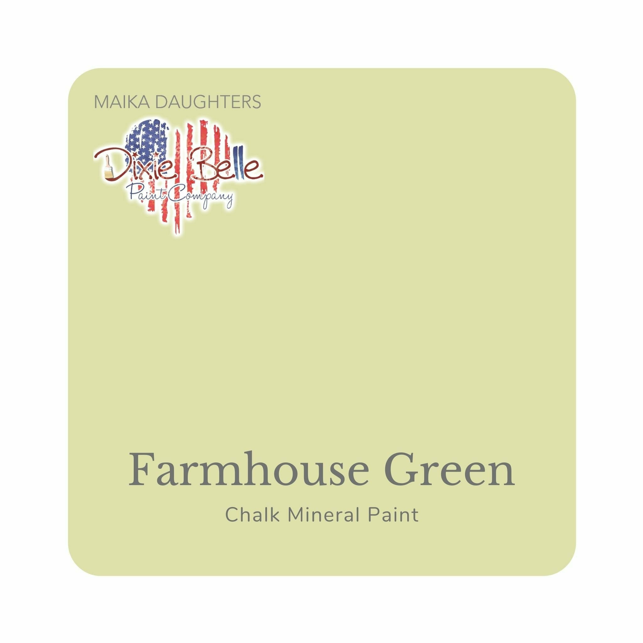 A square swatch card of Dixie Belle Paint Company’s Farmhouse Green Chalk Mineral Paint is against a white background. This color is a soft pale green with gray hues.
