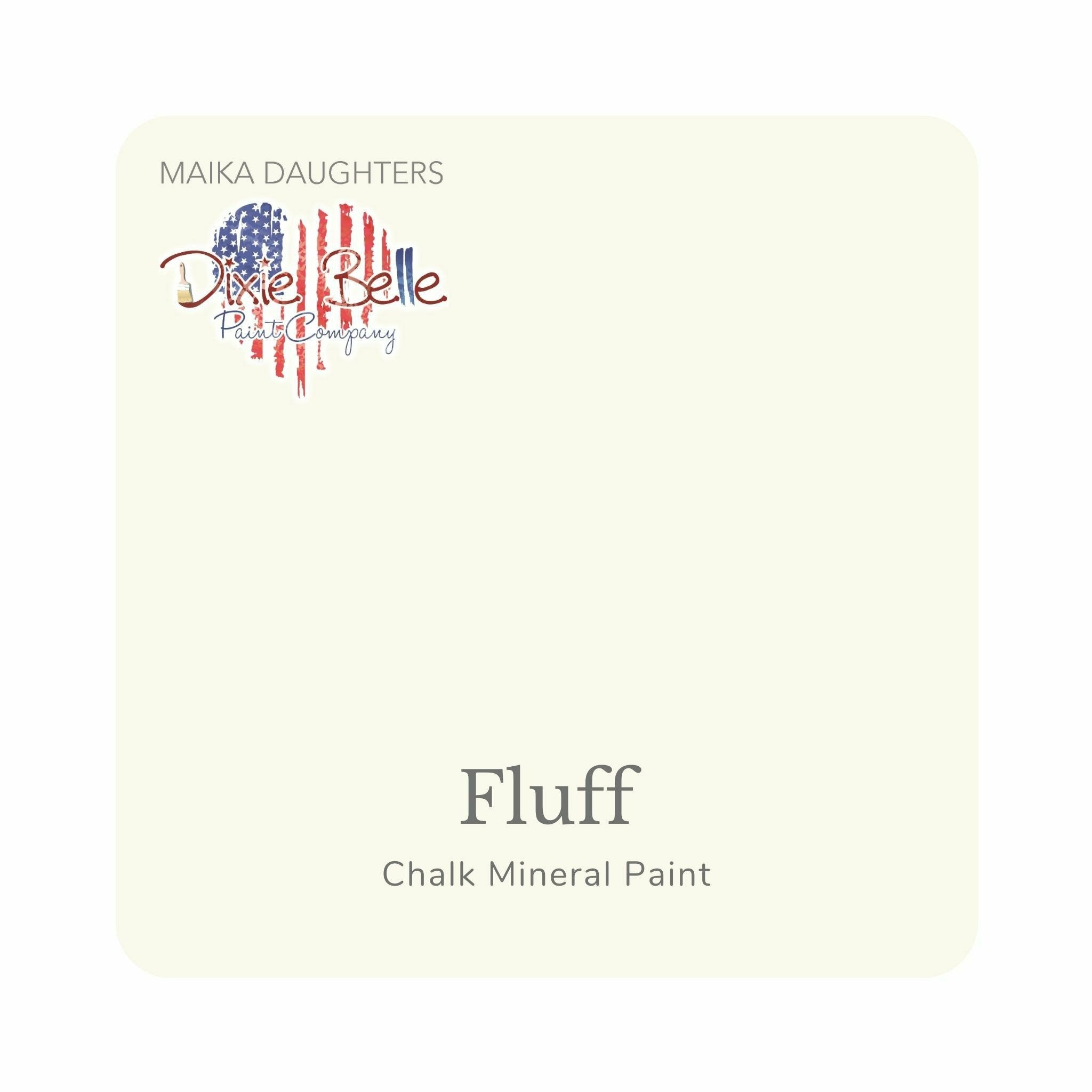 A square swatch card of Dixie Belle Paint Company’s Fluff Chalk Mineral Paint is against a white background. This color is a soft white with a hint of gray.