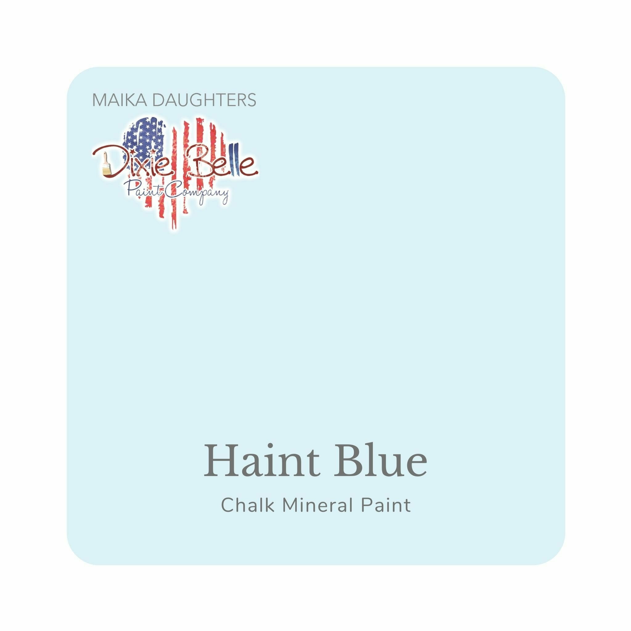 A square swatch card of Dixie Belle Paint Company’s Haint Blue Chalk Mineral Paint is against a white background. This color is a light baby blue