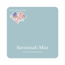 A square swatch card of Dixie Belle Paint Company’s Savannah Mist Chalk Mineral Paint is against a white background. This color is a light grey blue.