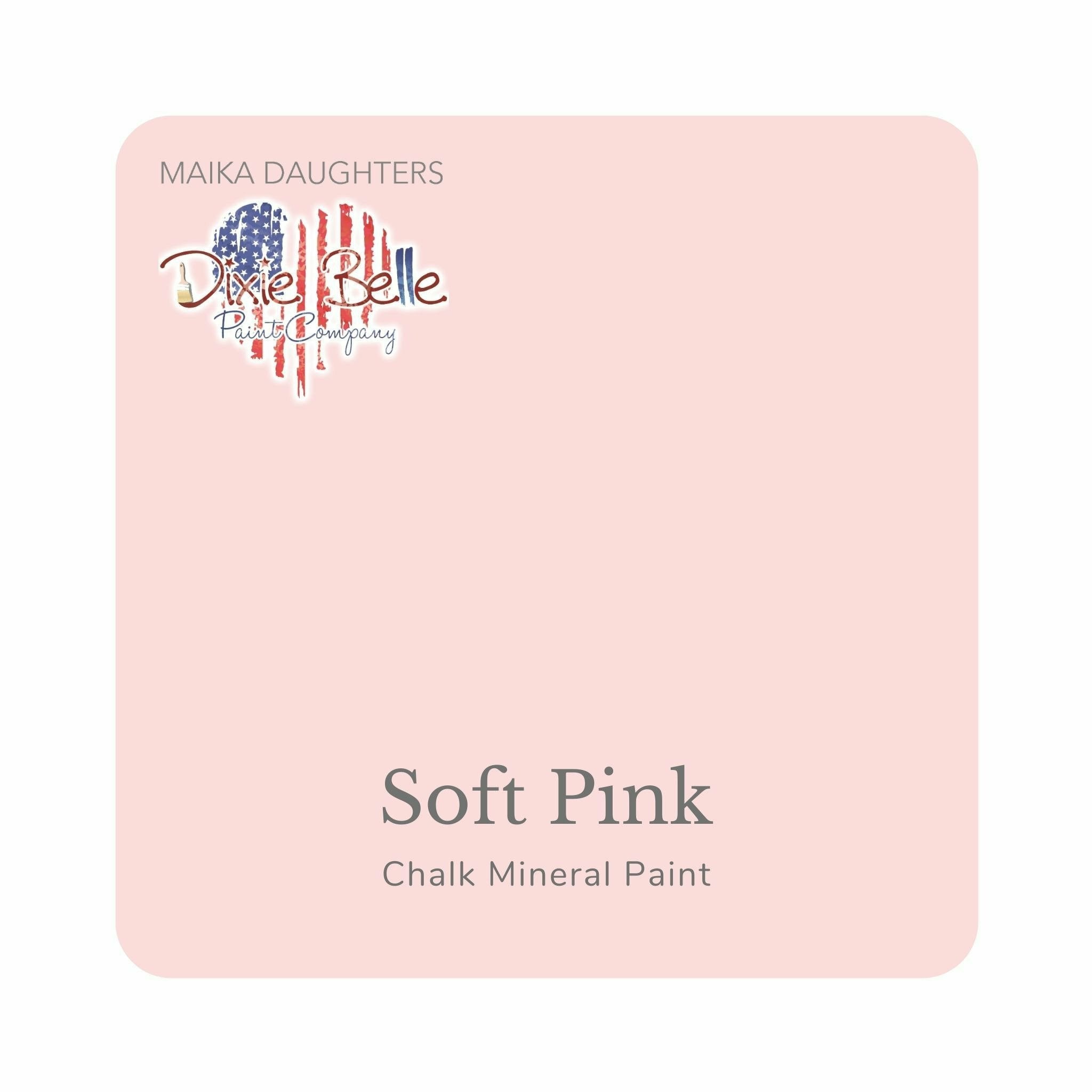 A square swatch card of Dixie Belle Paint Company’s Soft Pink Chalk Mineral Paint is against a white background. This color is a delicate pale blush.