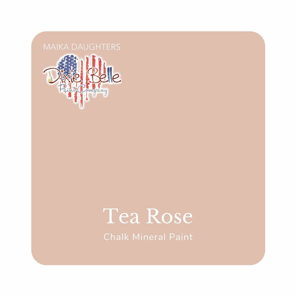 A square swatch card of Dixie Belle Paint Company’s Tea Rose Chalk Mineral Paint is against a white background. This color is a soft pink with a gray undertone.