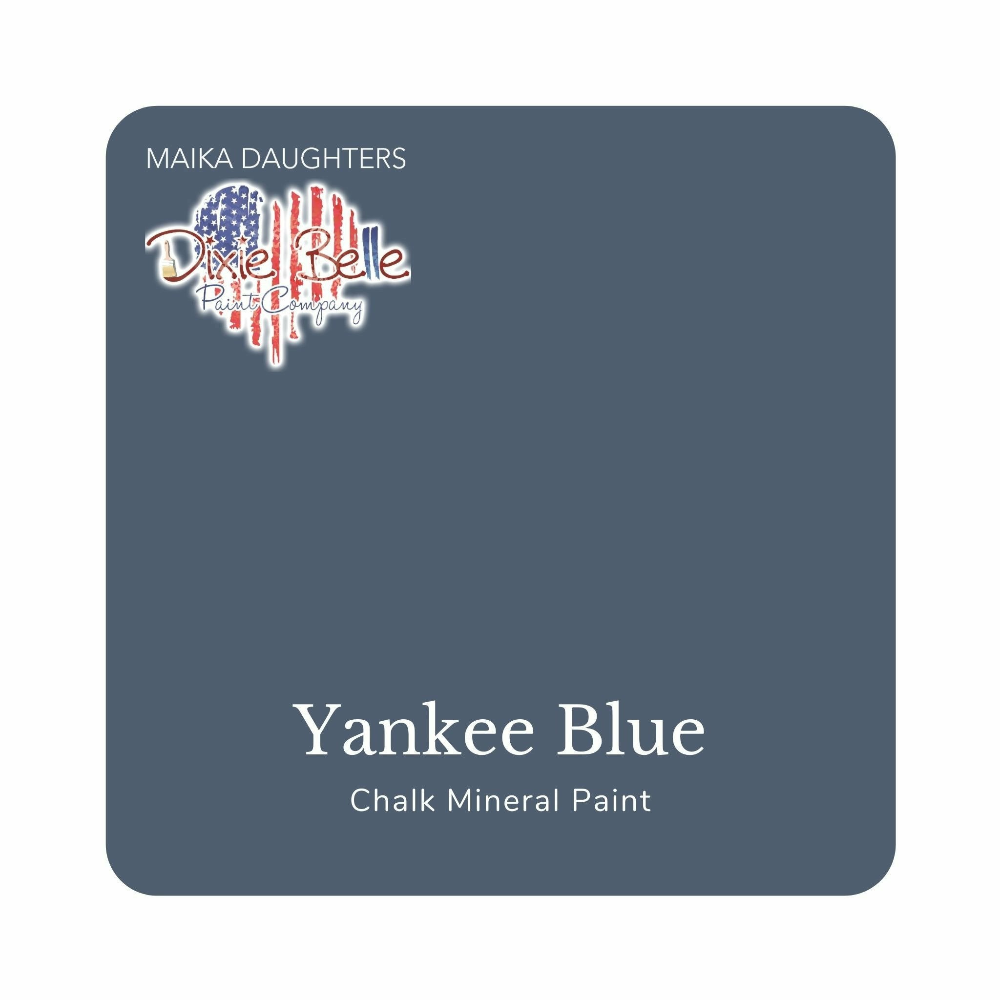 A square swatch card of Dixie Belle Paint Company’s Yankee Blue Chalk Mineral Paint is against a white background. This color is an aegean slate gray.