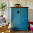 A vintage small armoire with 6 drawers on the right refurbished by Annie Loveday Furniture features Dixie Belle's Antebellum chalk mineral paint.