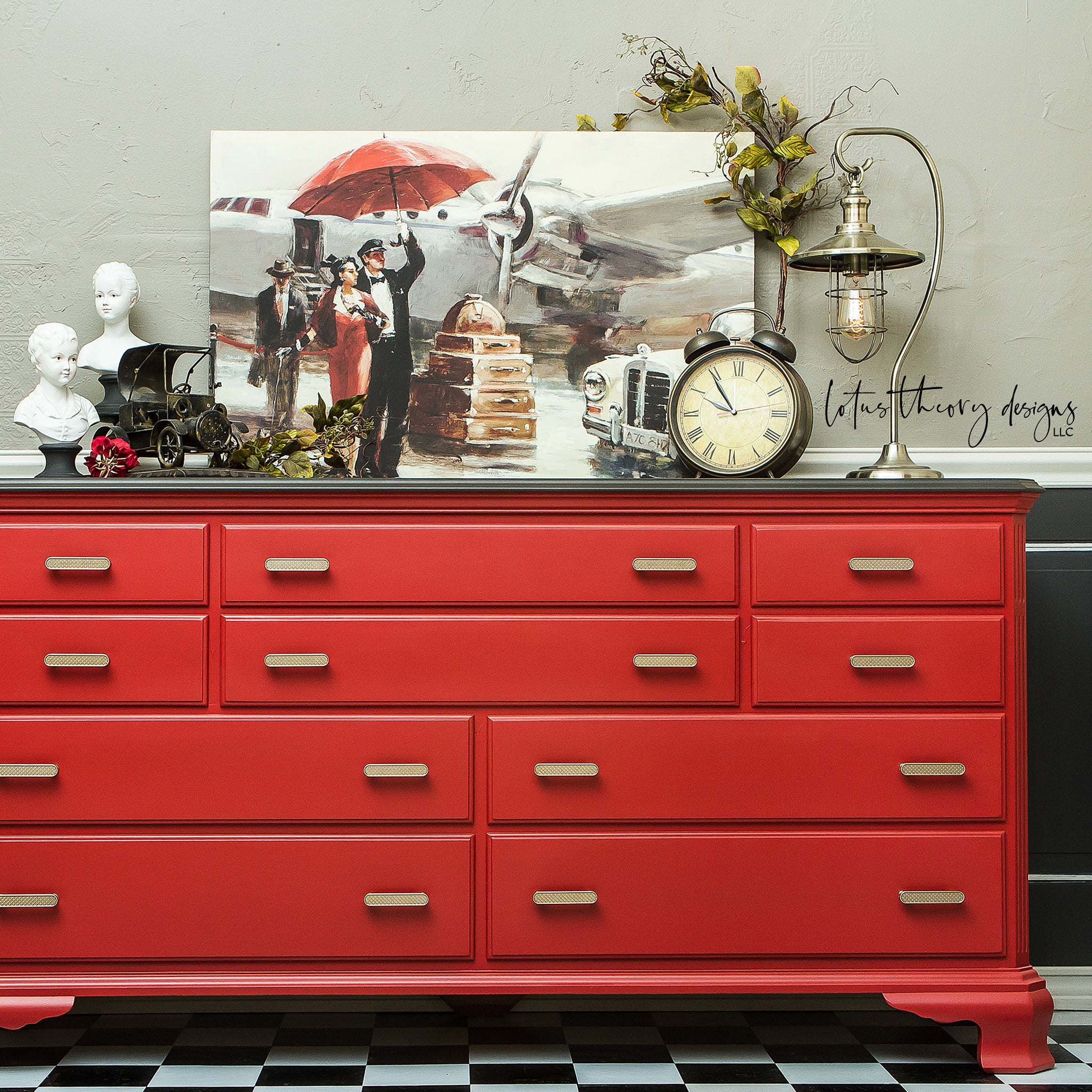A large dresser refurbished by Lotus Theory Designs LLC is painted with Dixie Belle's Barn Red chalk mineral paint.