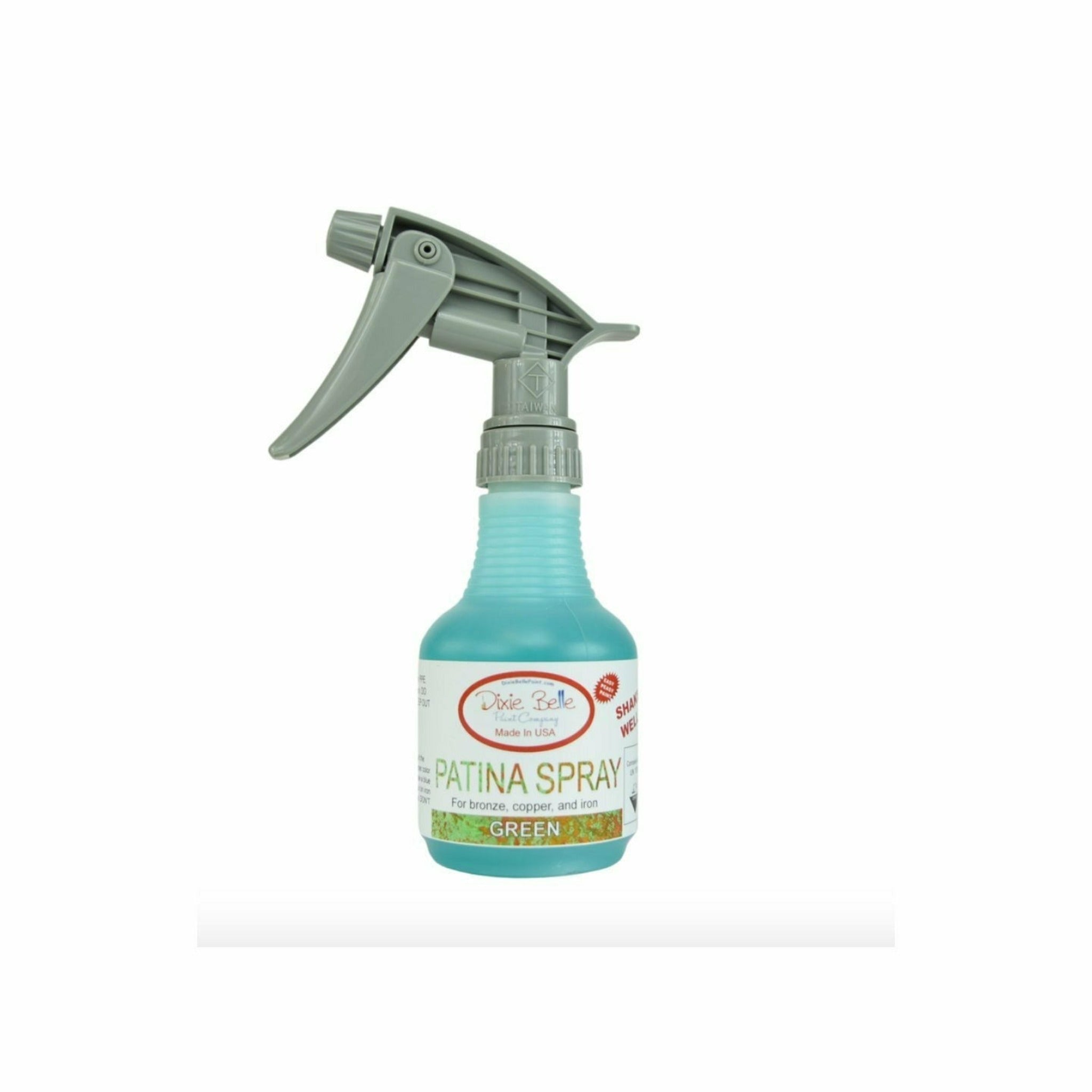 An 8oz spray bottle of Dixie Belle Paint Company's Patina Spray in Green is against a white background.