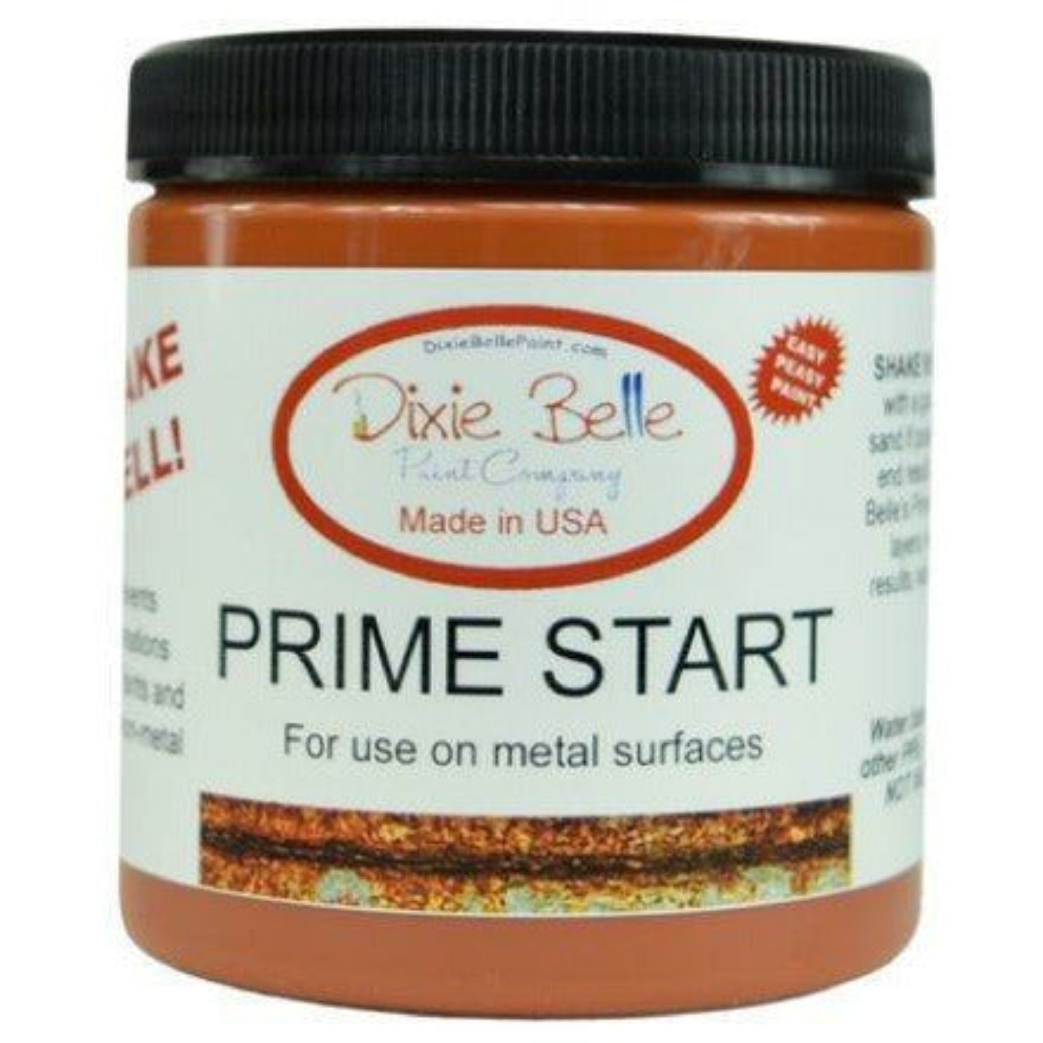 An 8oz container of Dixie Belle Paint Comapany's Prime Start is against a white background. This product is a protectantwhen using Patima products over metal.