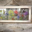 A rectangular glass with a wood frame refurbished by The Top Drawer is decorated with the Wildflowers & Butterflies transfer on the glass.