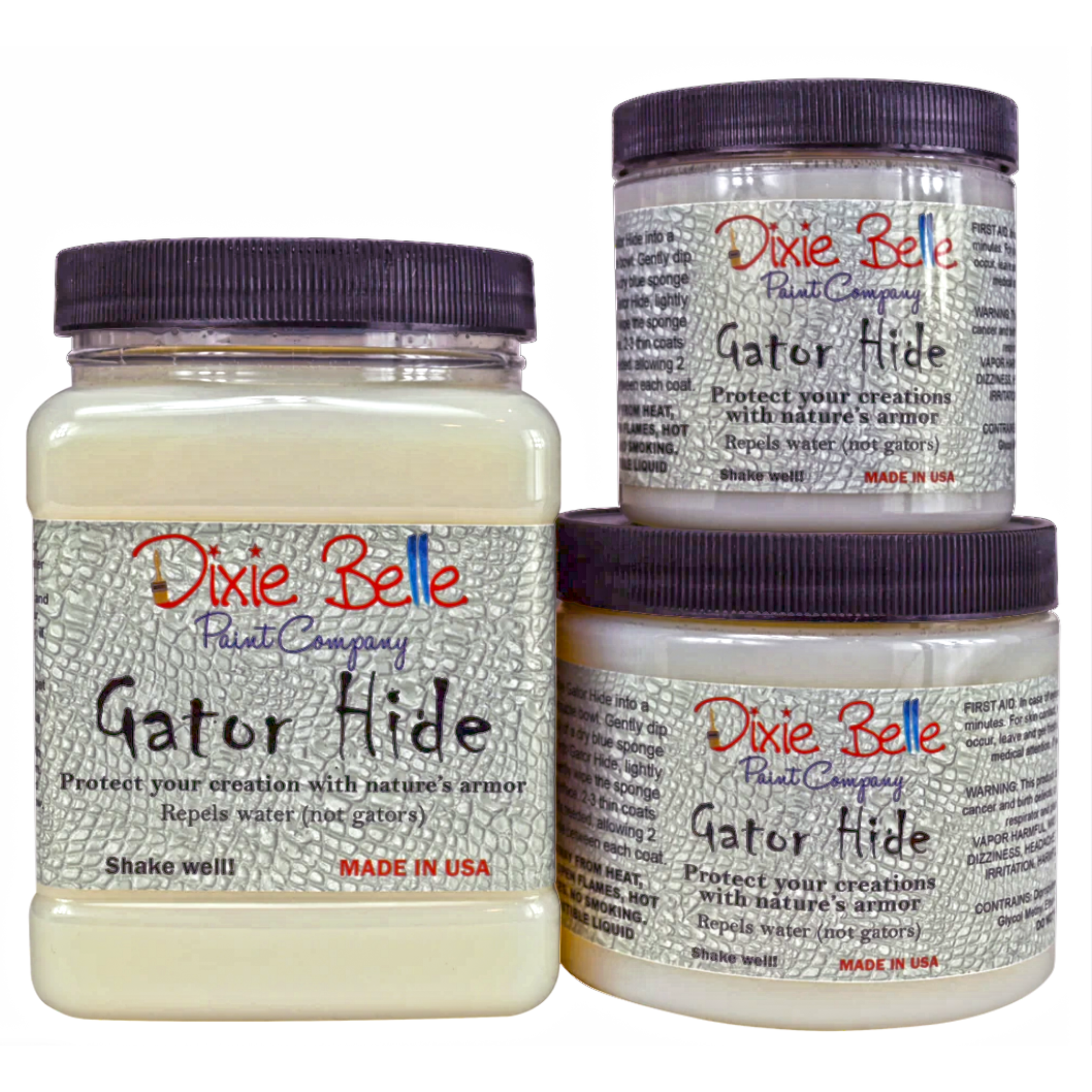 Three containers Dixie Belle Paint Company's Gator Hide are against a white background. A 32 oz container is on the left, and an 8 oz container sits on top of a 16 oz container on the right.