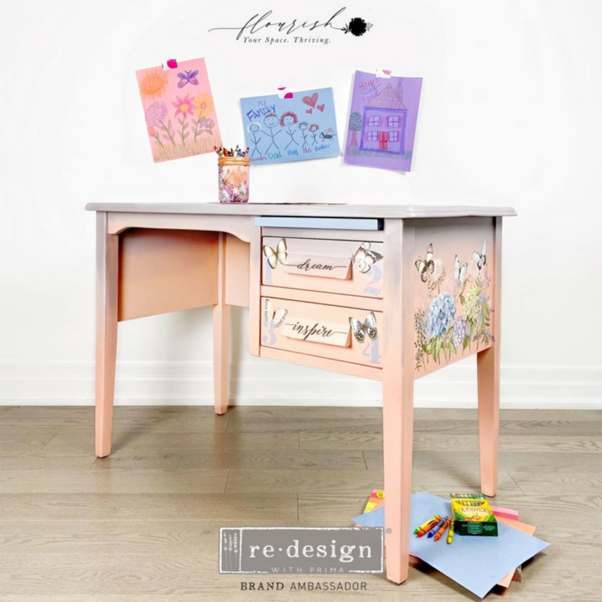 A kid desk refurbished by Flourish You Space Thriving is painted light peach and features ReDesign with Prima's Papillon Collection small transfer on it.