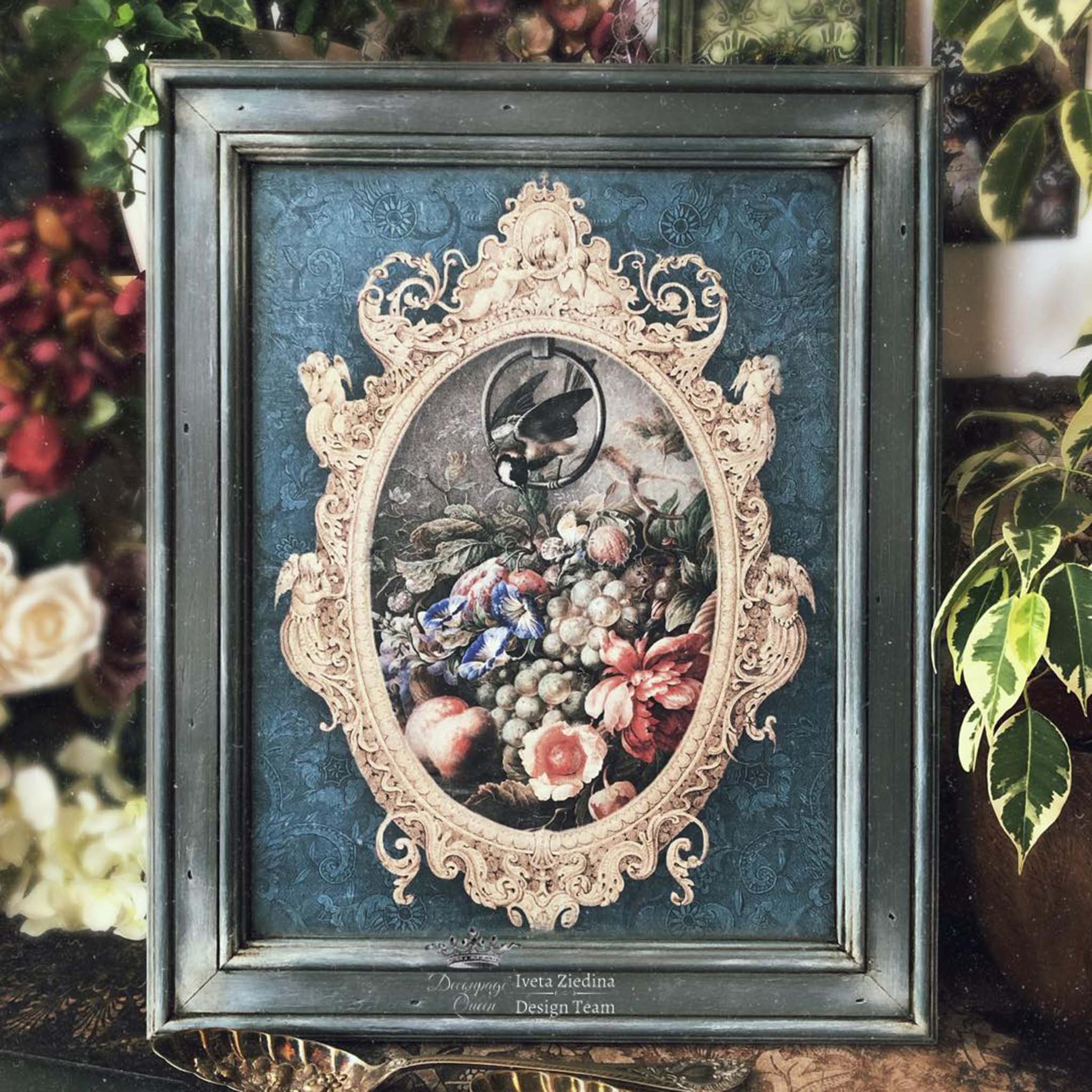 A2 rice paper design of a photo frame with a picture of an ornate frame with flowers and a bird on a perch.
