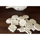 White mold castings made with Redesigns air dry modeling material.