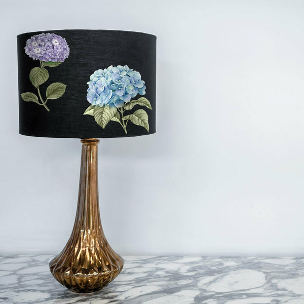 A bronze colored crystal lamp features ReDesign with Prima's Mystic Hydrangea small transfer on the black lamp shade.