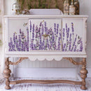 A vintage buffet table is painted white and features the Champs de Lavende transfer on its doors.