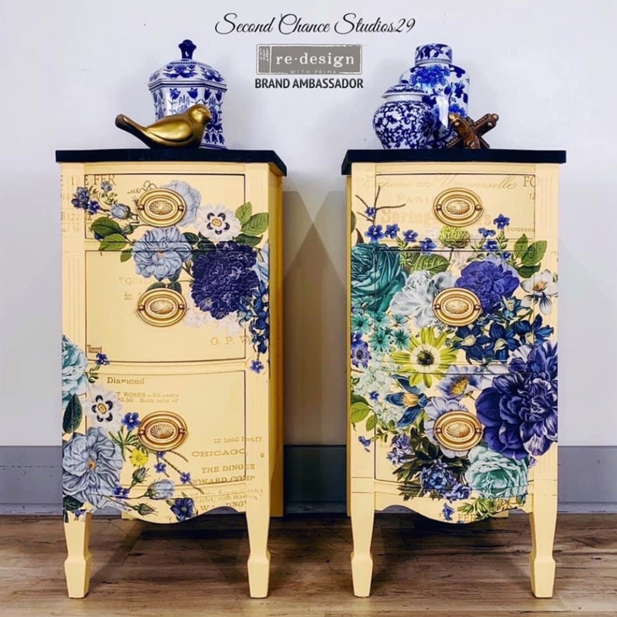 Two vintage nightstands refurbished by Second Chance Studios 29, a ReDesign with Prima Brand Ambassador, are painted a muted yellow and feature the Cosmic Roses transfer on them.