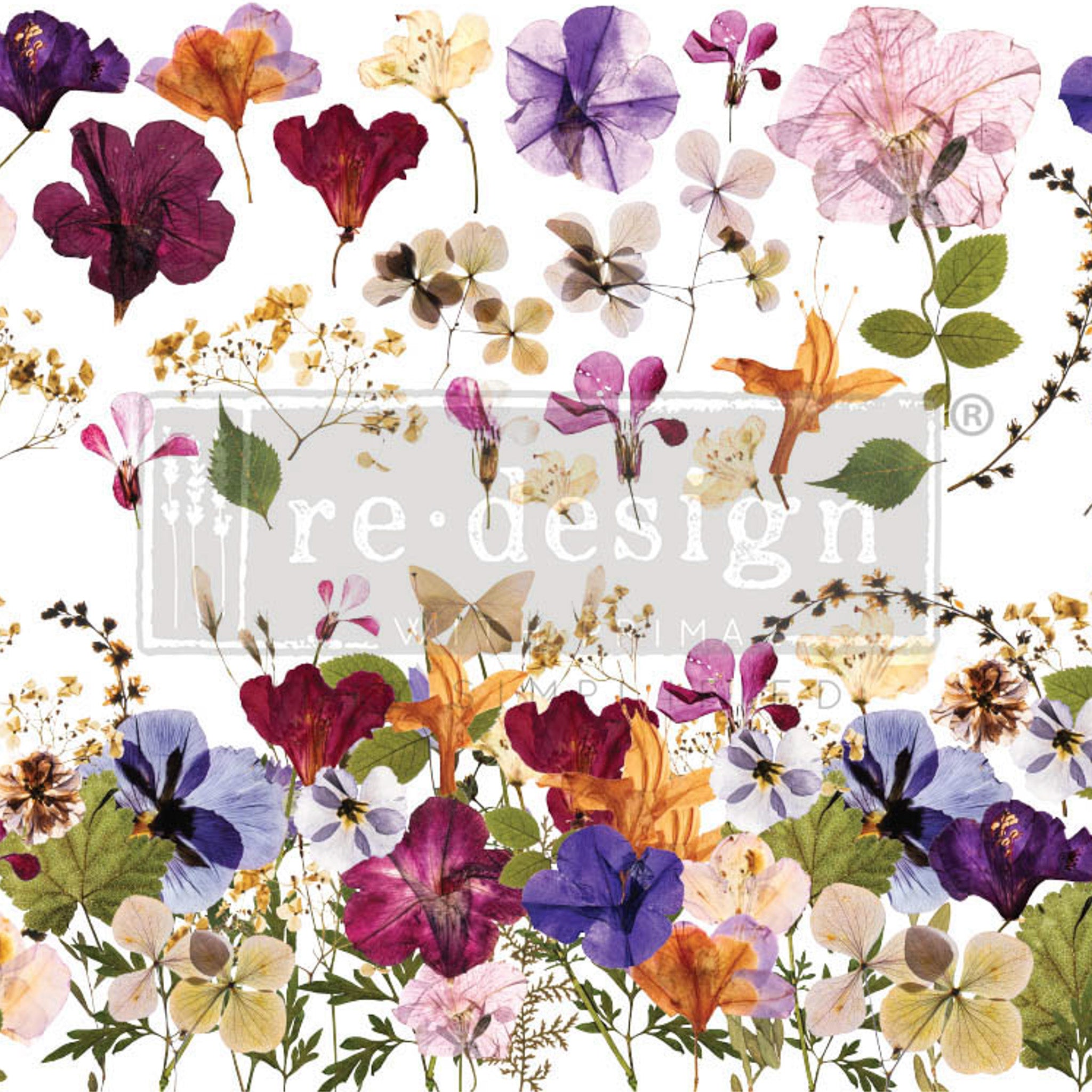 Rub-on transfer design of colorful pressed flowers.