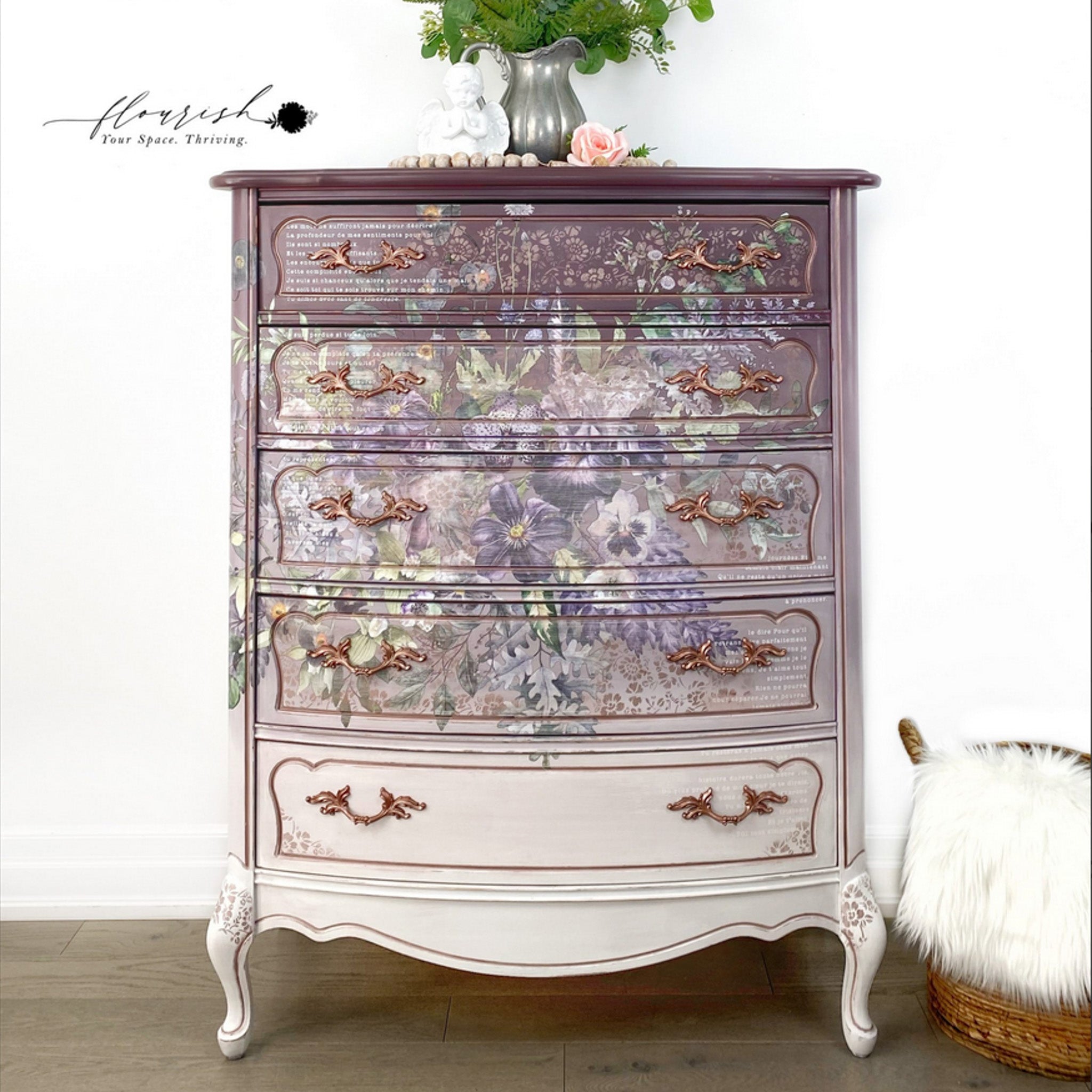 A vintage 5-drawer chest dresser refurbished by Flourish Your Space Thriving is painted an ombre purple down to white and features ReDesign with Prima's Vigorous Violet transfer on it.