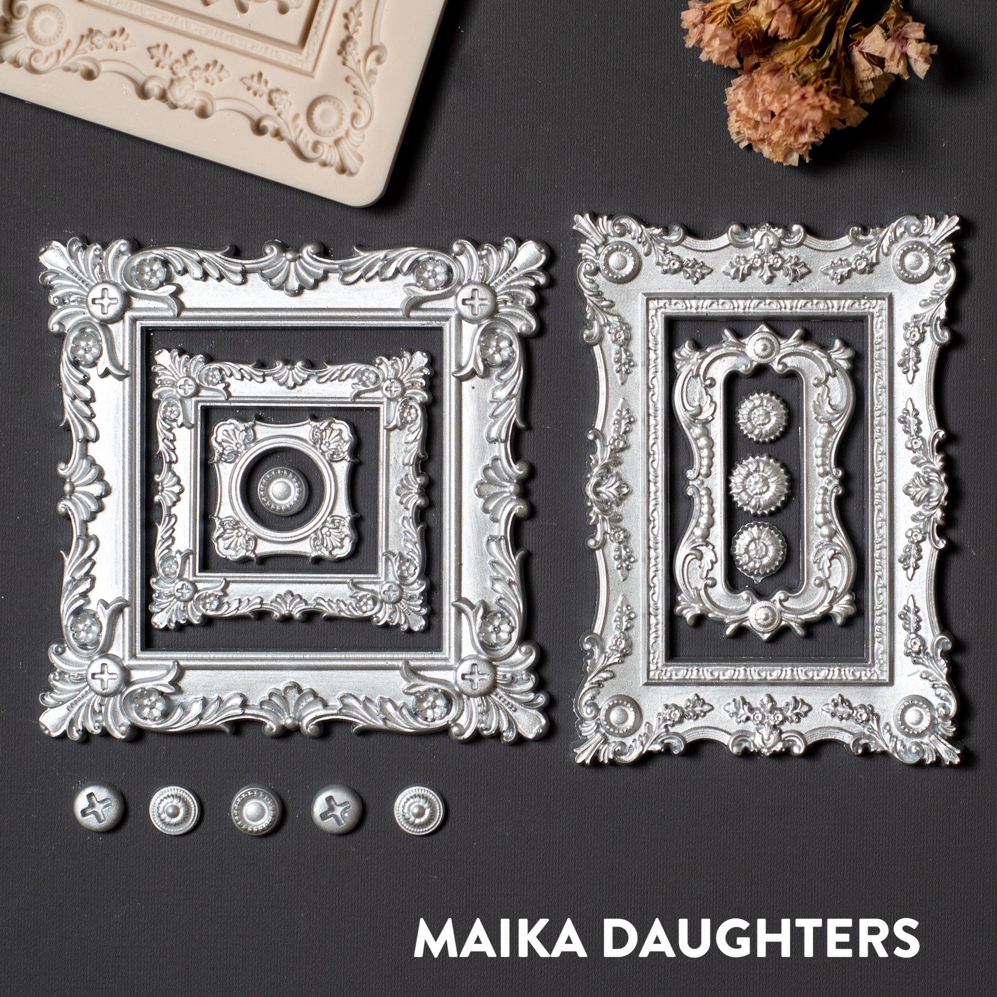 Silver painted castings of 5 ornate scroll frames and button style corner accent pieces.