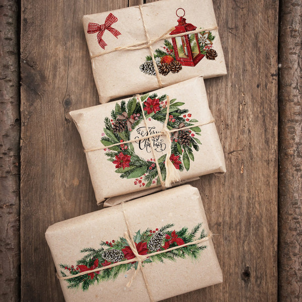 Three natural paper wrapped gifts feature the Classic Christmas small transfer on them.
